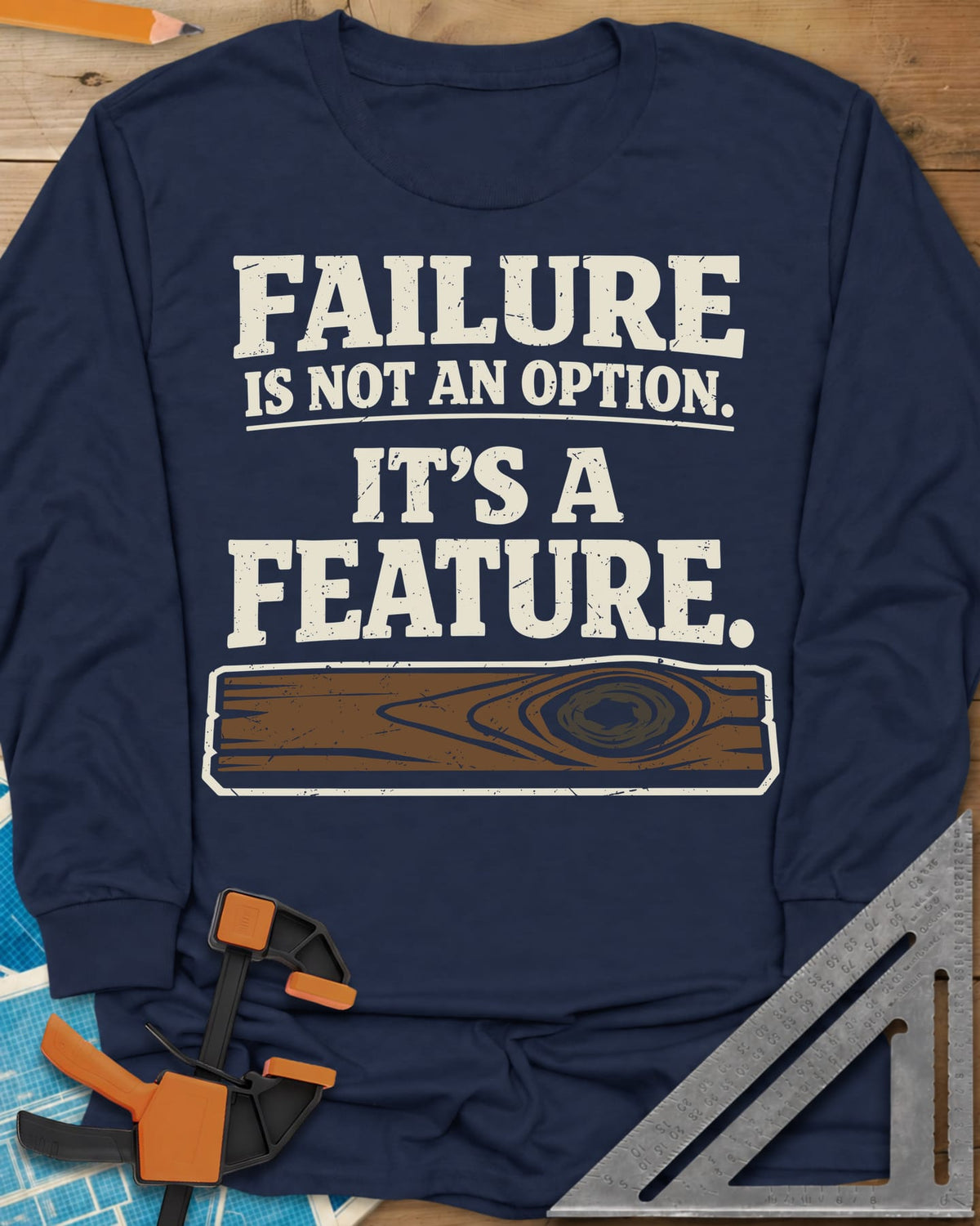 Failure Is A Feature long sleeve shirt in Navy, a knotty plank with a swirling knot under the slogan