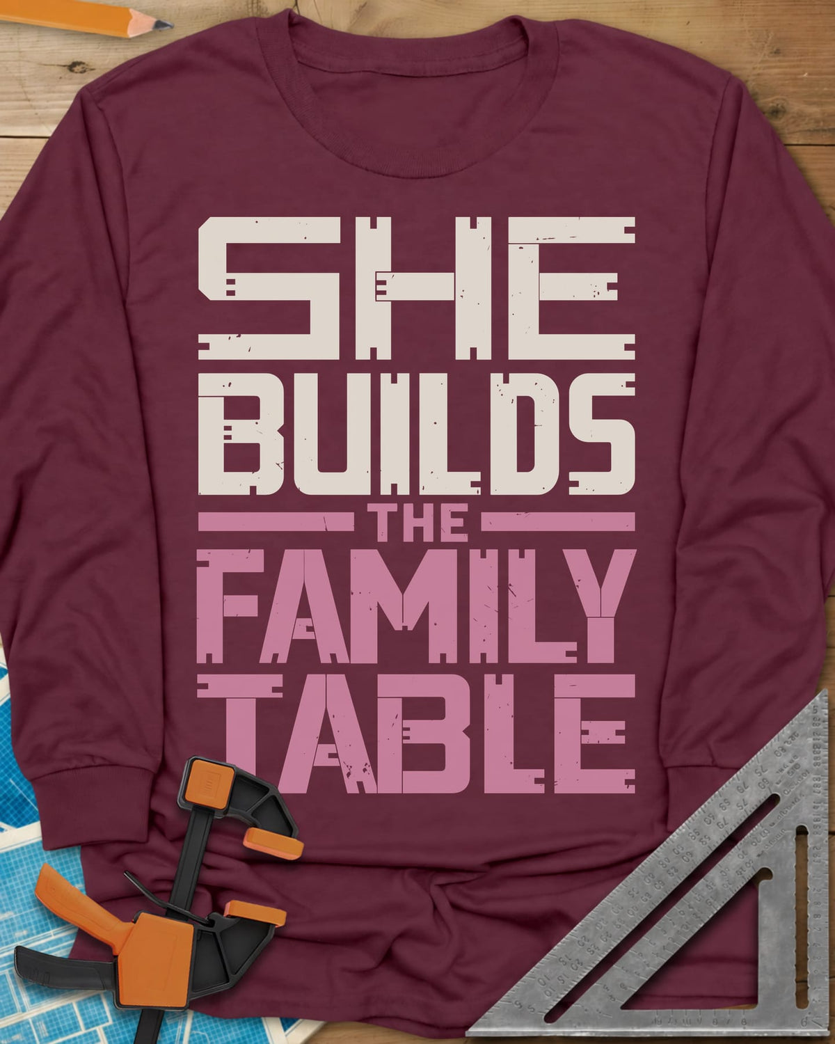 Family Table long sleeve shirt in Maroon, stacked block letters with notches cut like joinery
