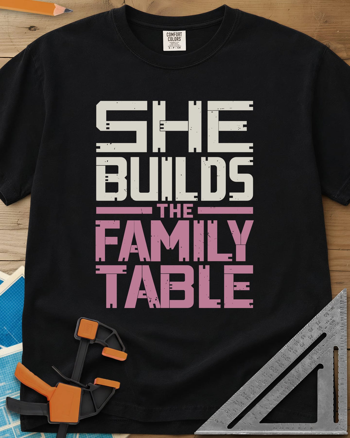 Family Table heavyweight tee in Black, stacked block letters with notches cut like joinery