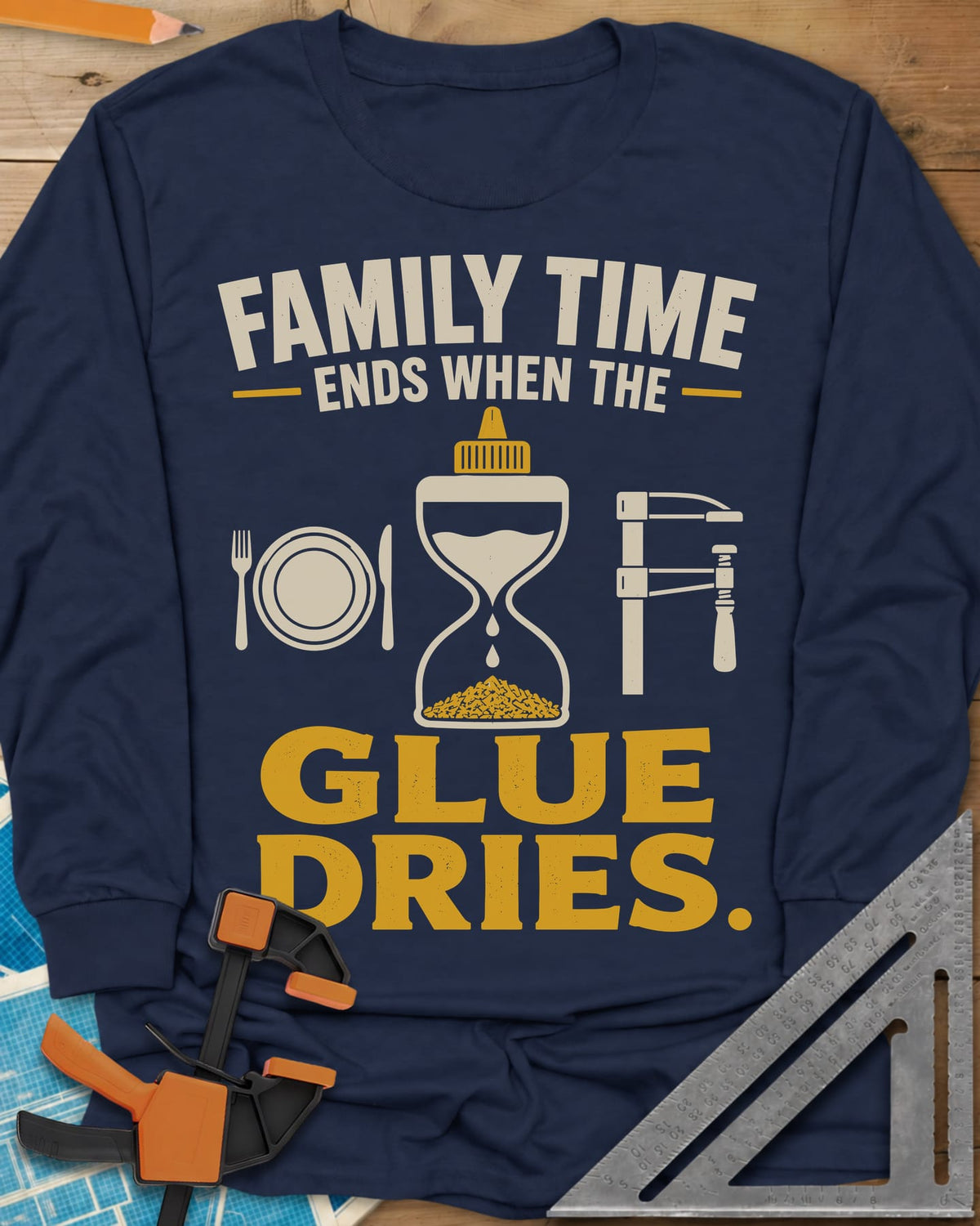 Family Time Ends When The Glue Dries long sleeve shirt in Navy, a place setting, a glue-bottle hourglass and a bar clamp