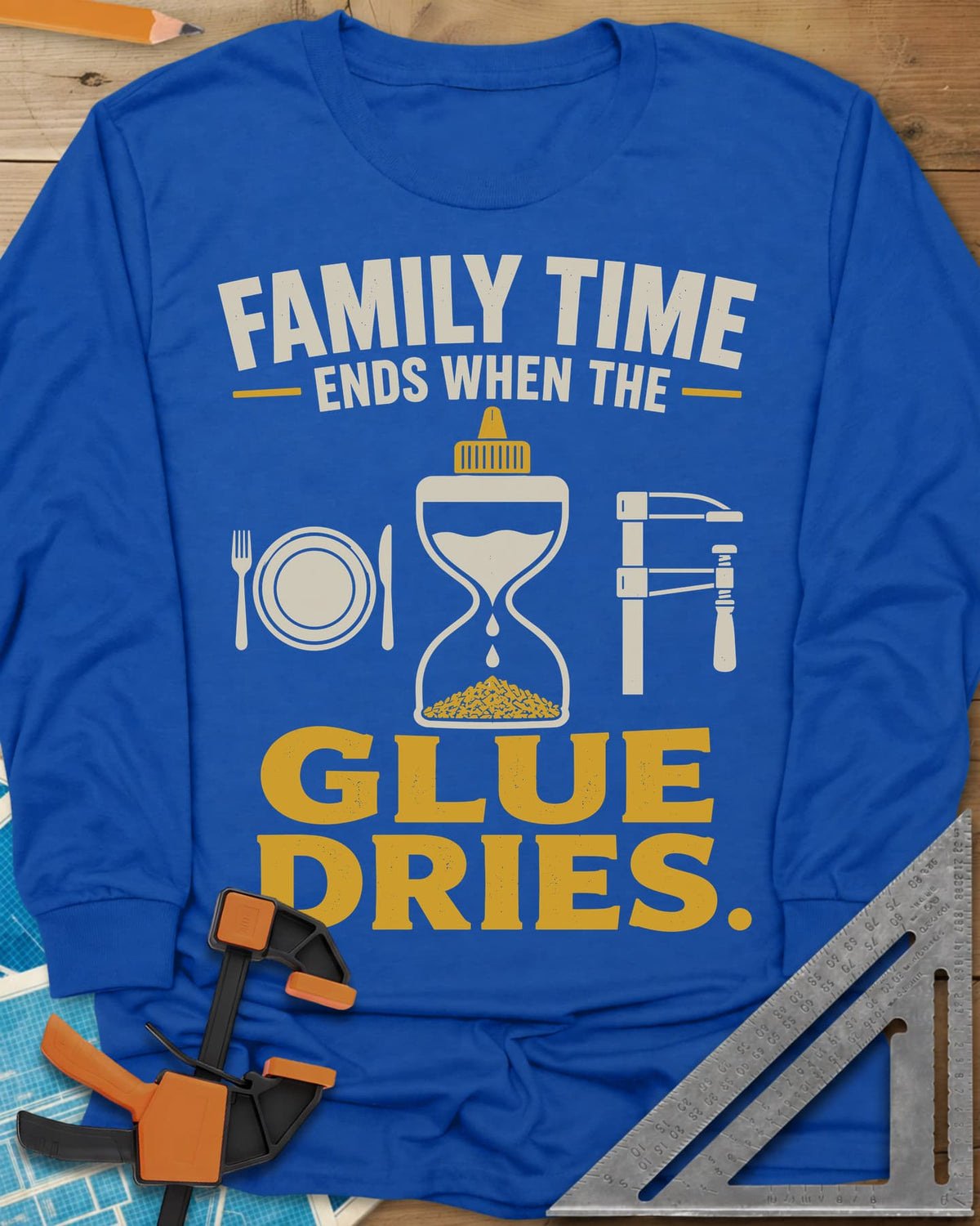 Family Time Ends When The Glue Dries long sleeve shirt in Royal, a place setting, a glue-bottle hourglass and a bar clamp