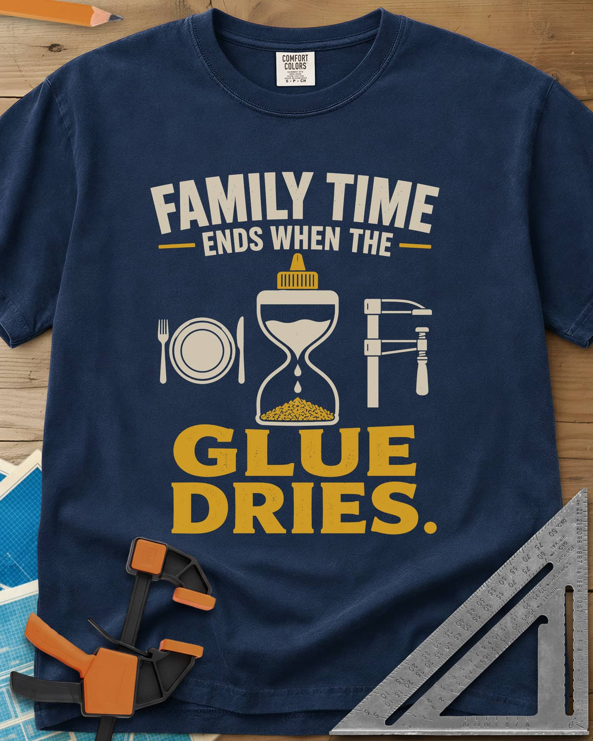 Family Time Ends When The Glue Dries heavyweight tee in Navy, a place setting, a glue-bottle hourglass and a bar clamp