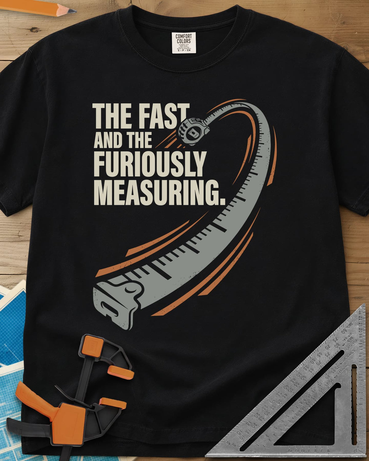 Fast And Furiously Measuring heavyweight tee in Black, a tape measure whipping through the air with speed lines