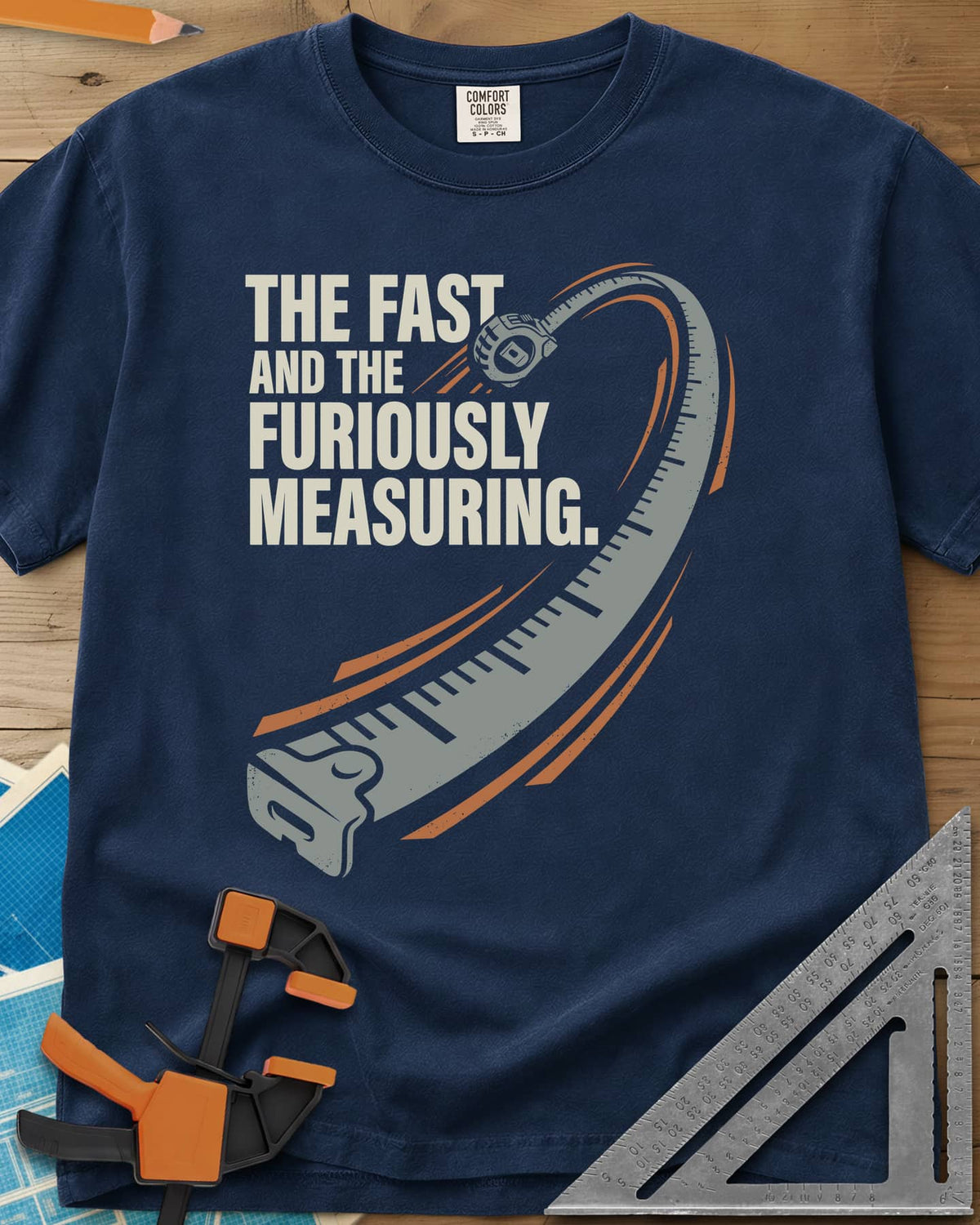 Fast And Furiously Measuring heavyweight tee in Navy, a tape measure whipping through the air with speed lines