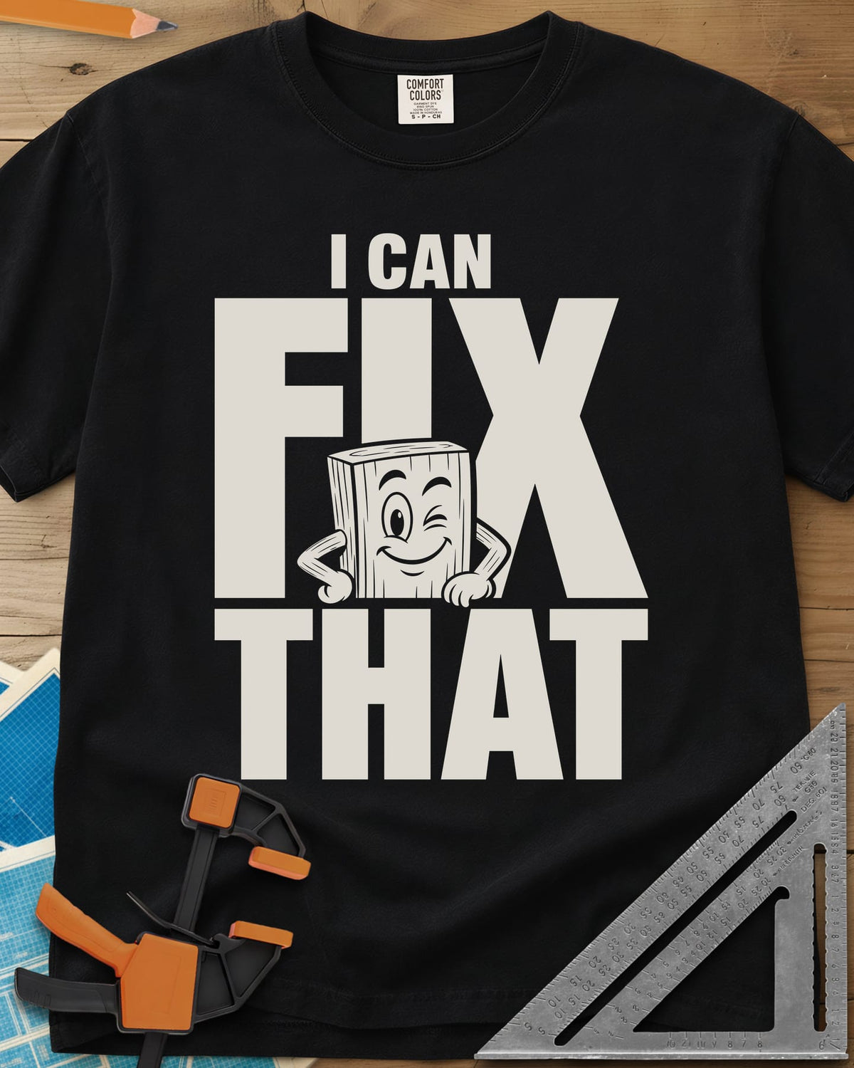 Fix That heavyweight tee in Black, a winking cartoon wood block peeking from behind big letters