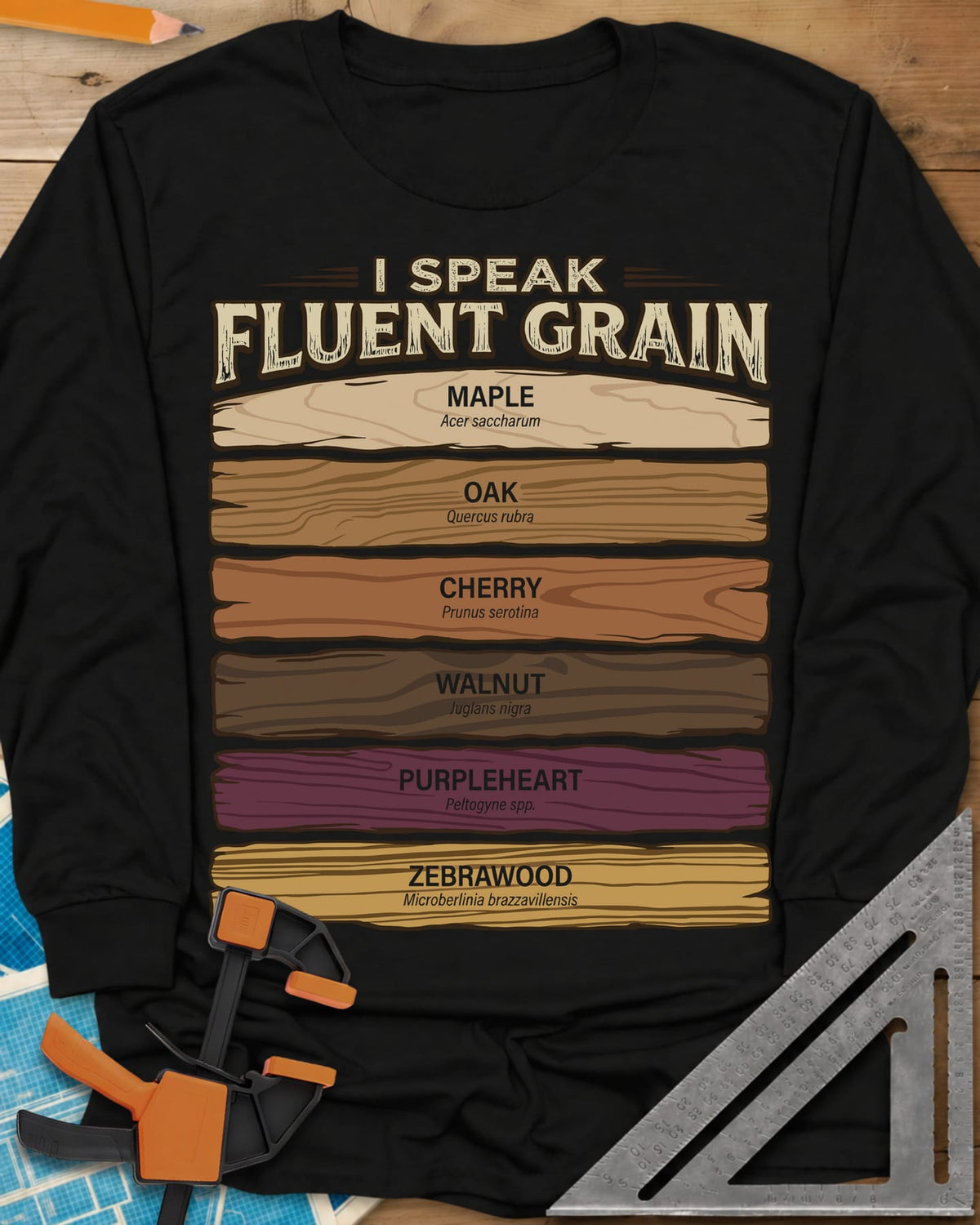 Fluent Grain long sleeve shirt in Black, six wood plank swatches labeled maple, oak, cherry, walnut and more
