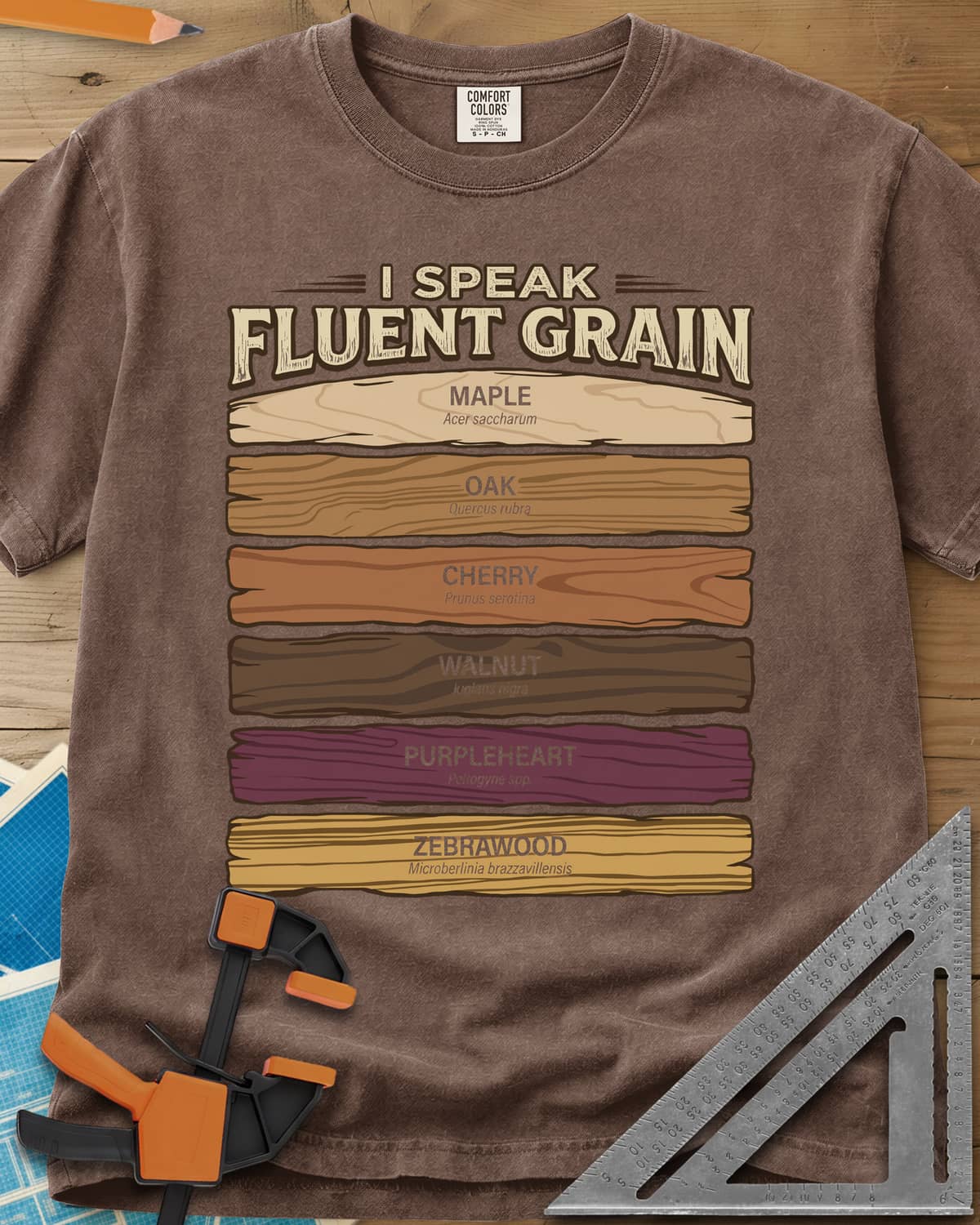 Fluent Grain heavyweight tee in Espresso, six wood plank swatches labeled maple, oak, cherry, walnut and more