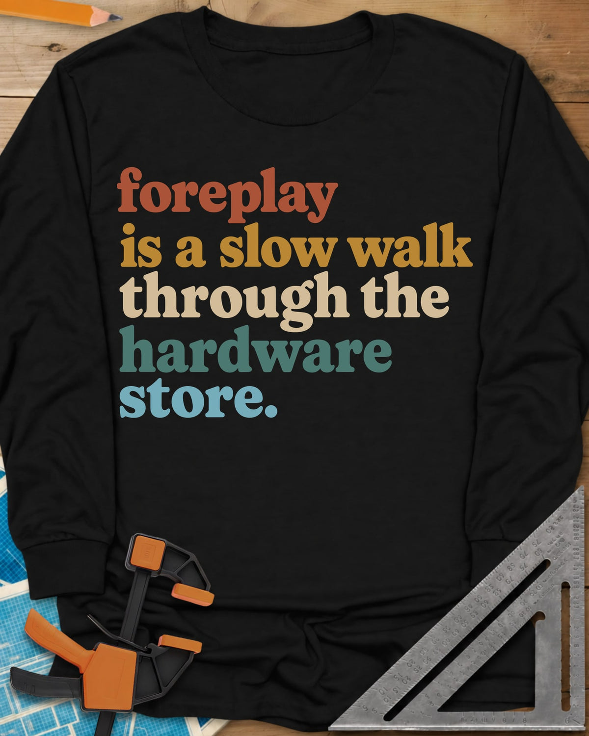 Foreplay Hardware Store long sleeve shirt in Black, stacked lowercase lettering in rust, mustard, cream, teal and blue
