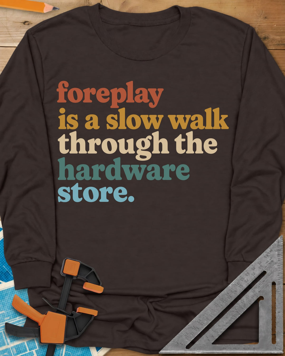 Foreplay Hardware Store long sleeve shirt in Dark Chocolate, stacked lowercase lettering in rust, mustard, cream, teal and