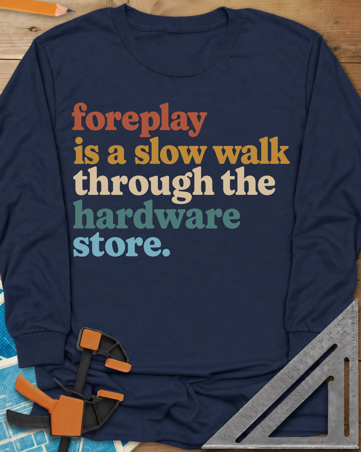 Foreplay Hardware Store long sleeve shirt in Navy, stacked lowercase lettering in rust, mustard, cream, teal and blue