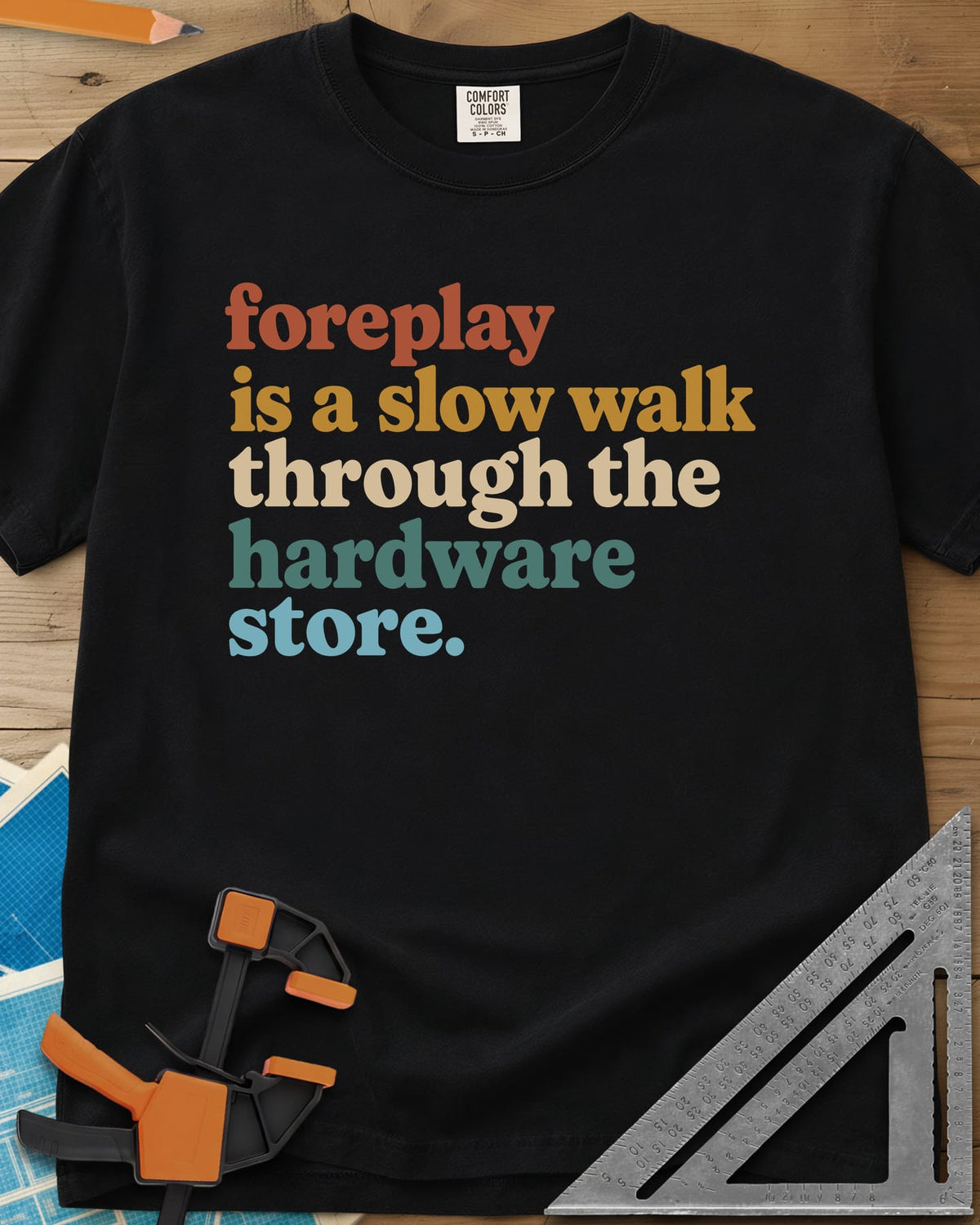 Foreplay Hardware Store heavyweight tee in Black, stacked lowercase lettering in rust, mustard, cream, teal and blue