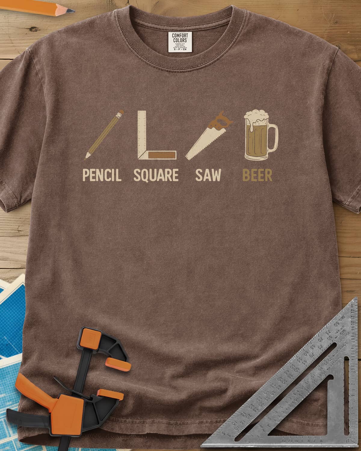 Four Essential Tools heavyweight tee in Espresso, a pencil, a try square, a handsaw and a frothy beer mug