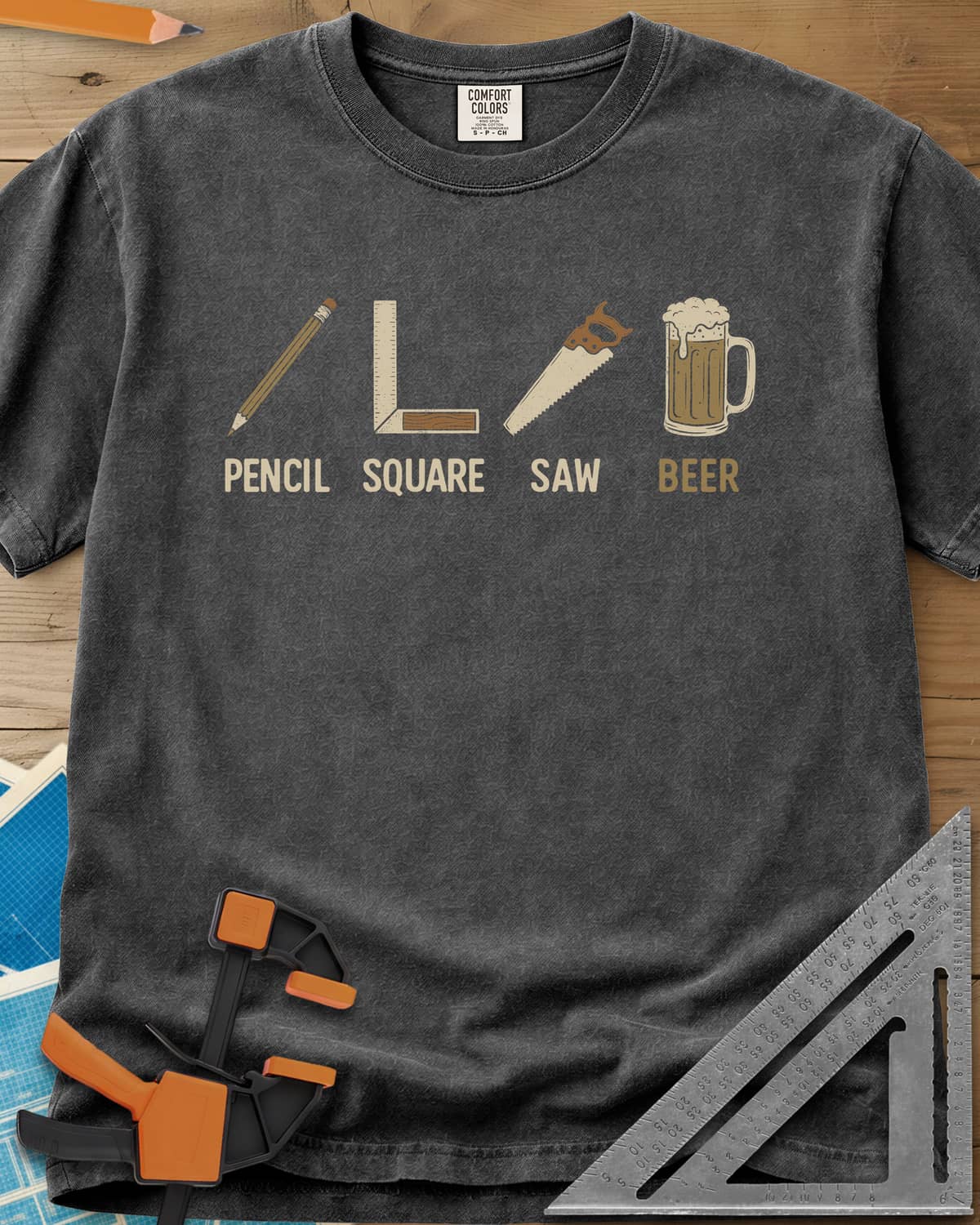 Four Essential Tools heavyweight tee in Pepper, a pencil, a try square, a handsaw and a frothy beer mug