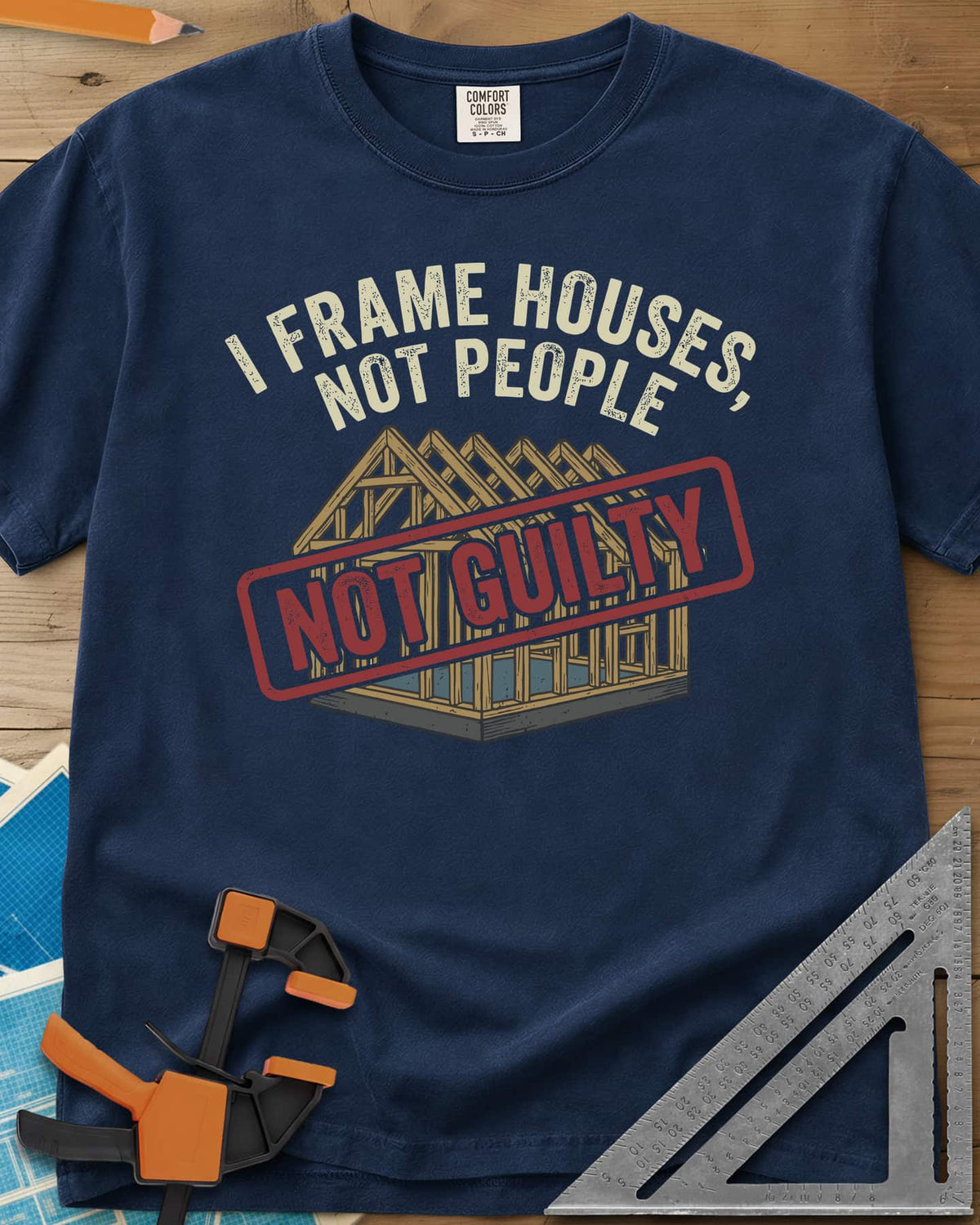 Frame Houses heavyweight tee in Navy, a wood-framed house with a red NOT GUILTY stamp