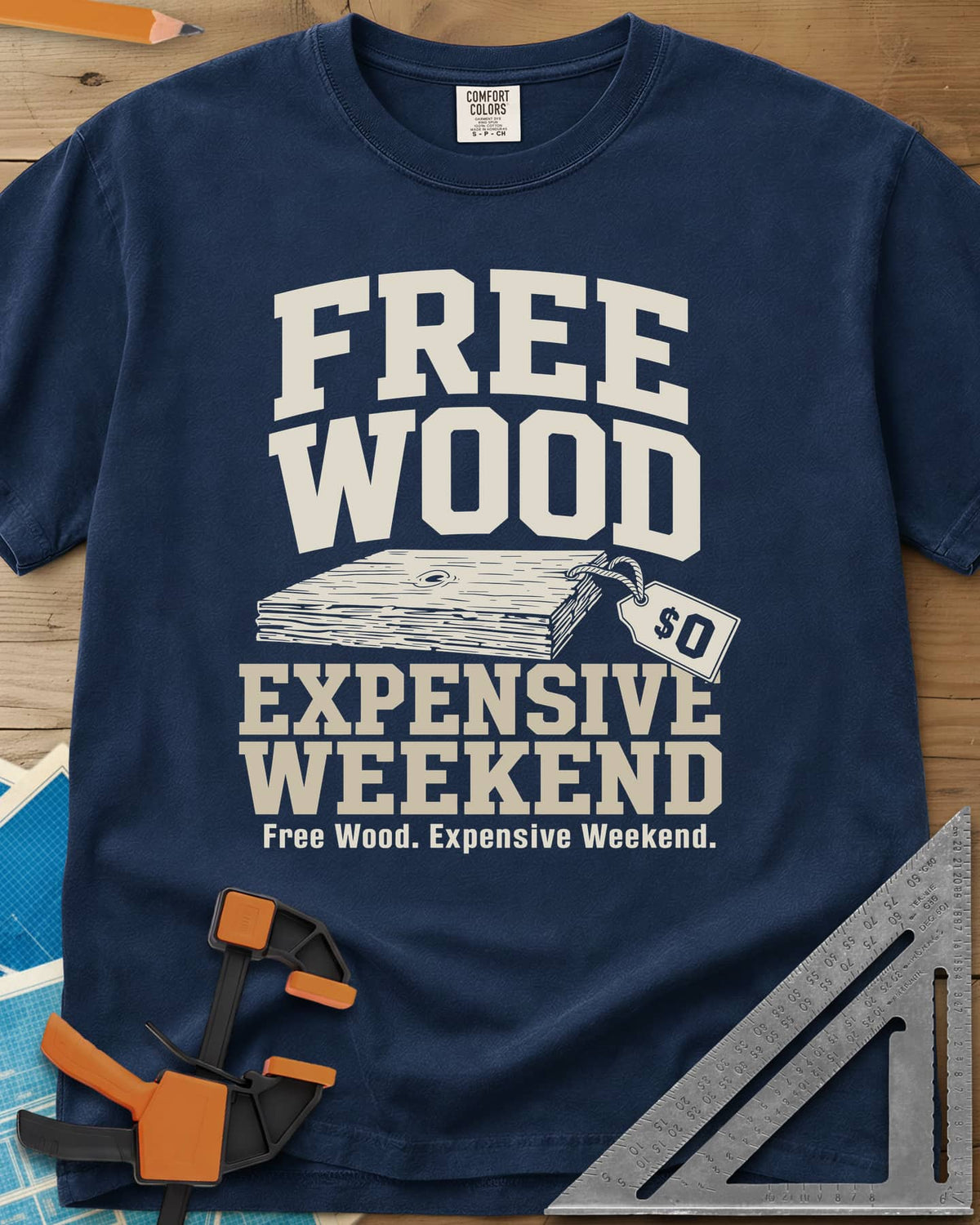 Free Wood heavyweight tee in Navy, a stack of boards with a hang tag marked zero dollars