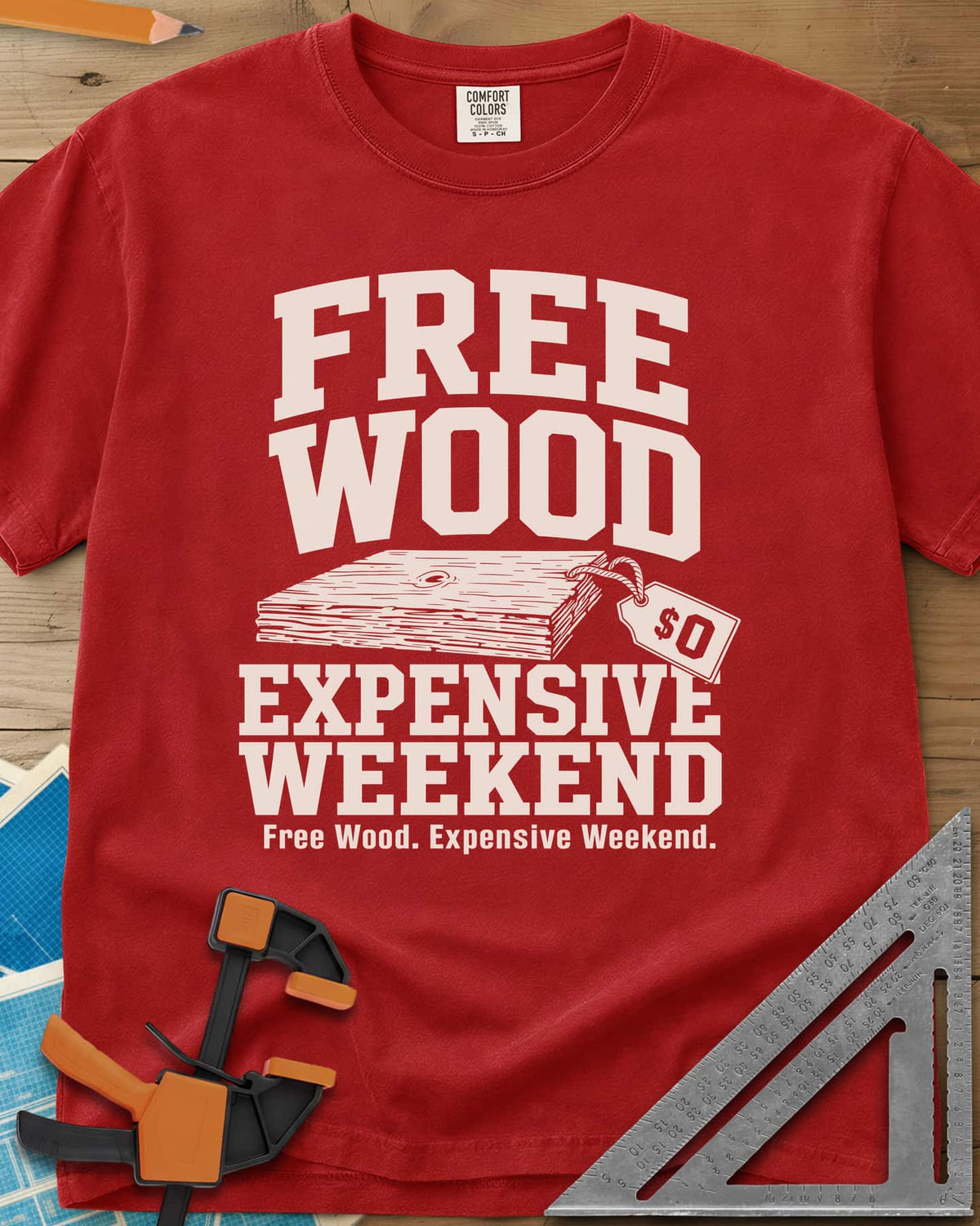 Free Wood heavyweight tee in Red, a stack of boards with a hang tag marked zero dollars