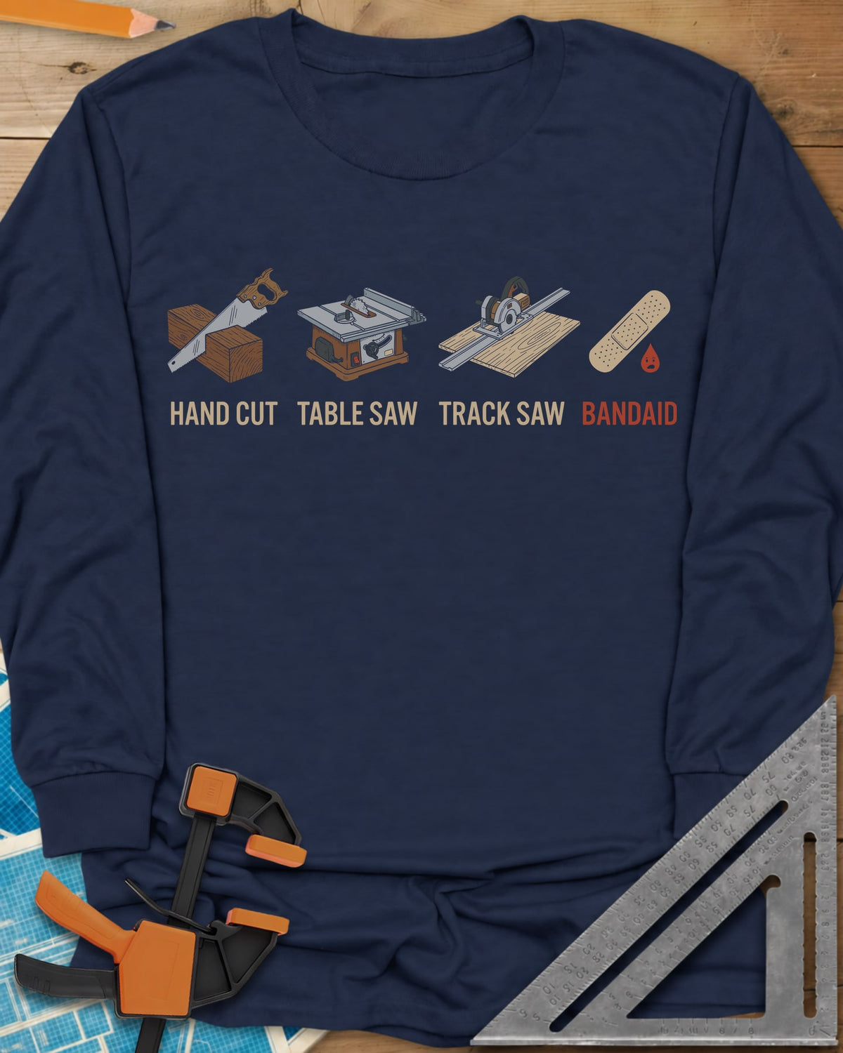 From Handsaw to Bandaid long sleeve shirt in Navy, a handsaw, a table saw, a track saw and a bandage with a drop