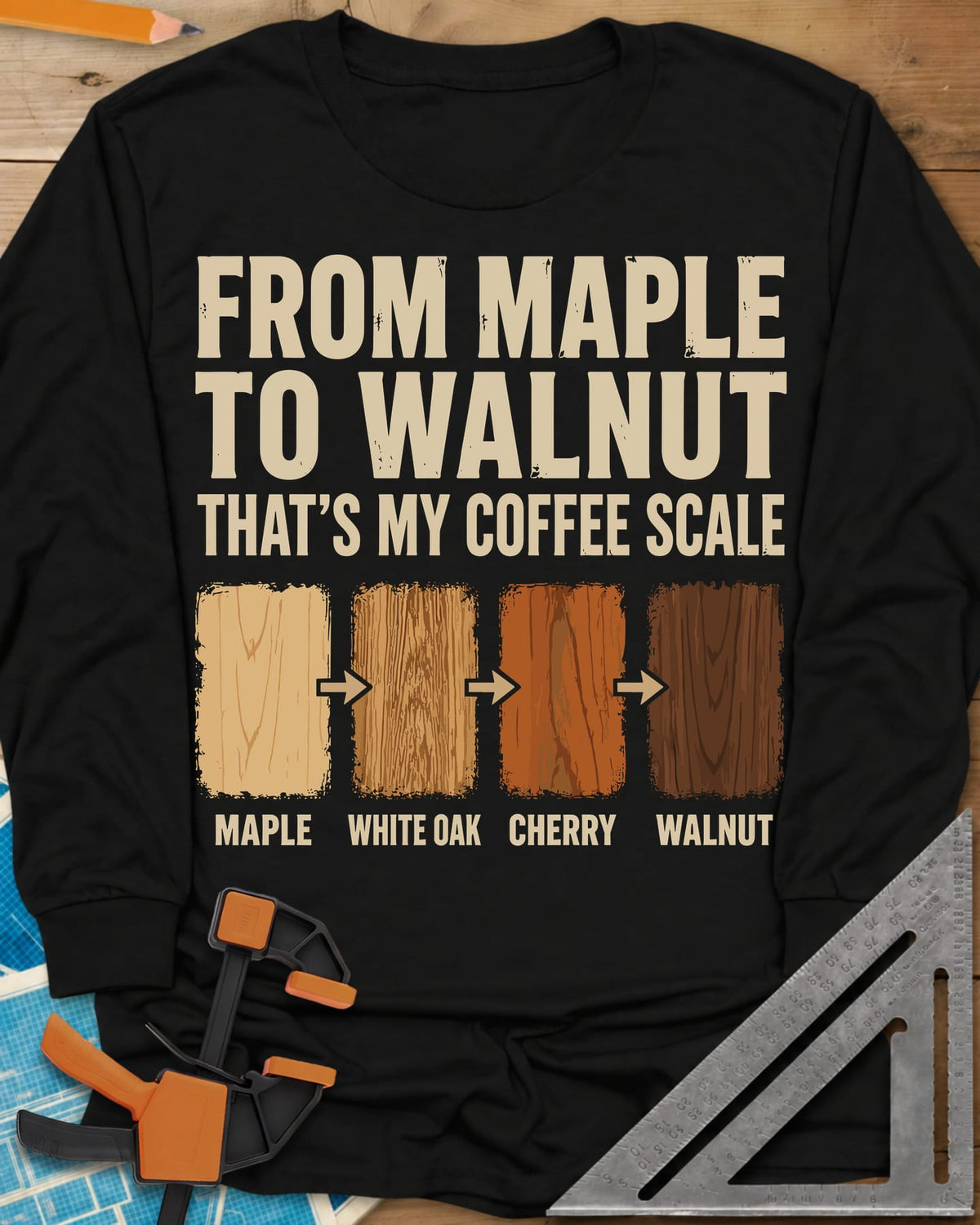 From Maple To Walnut long sleeve shirt in Black, four wood swatches from maple to walnut with arrows between