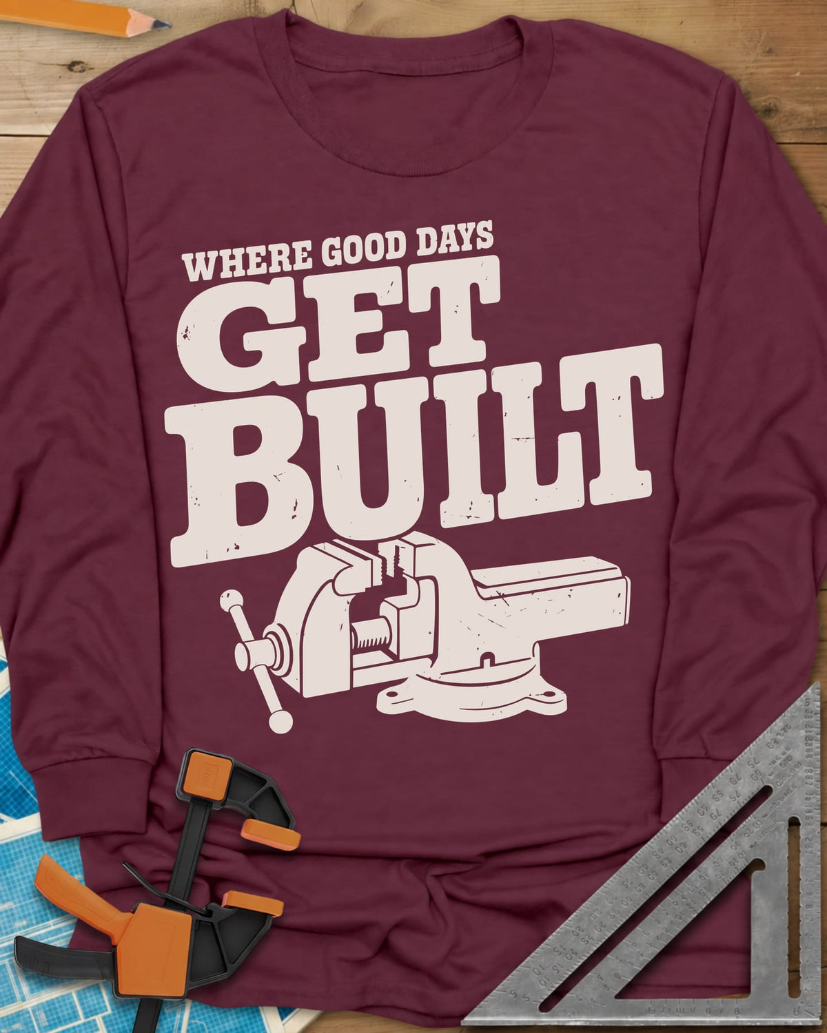 Get Built long sleeve shirt in Maroon, a swivel-base bench vise under bold slab-serif lettering