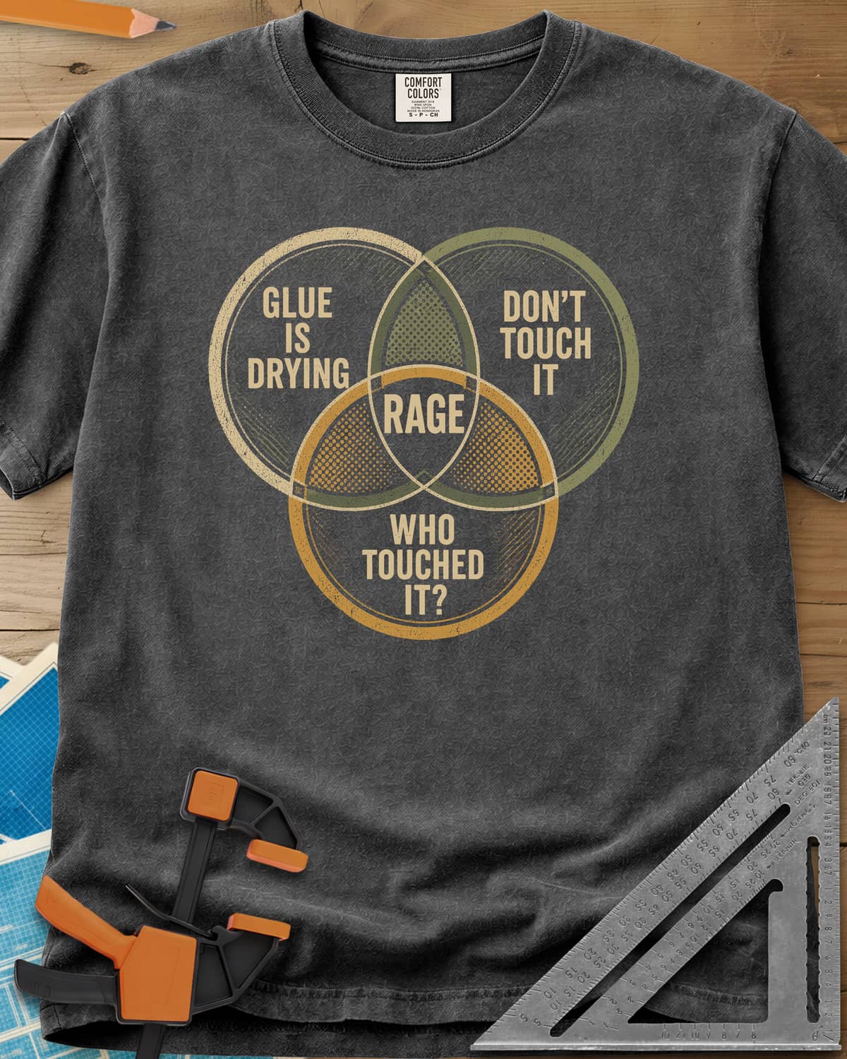 Glue Is Drying Rage heavyweight tee in Pepper, a three-circle Venn diagram with RAGE where the circles overlap