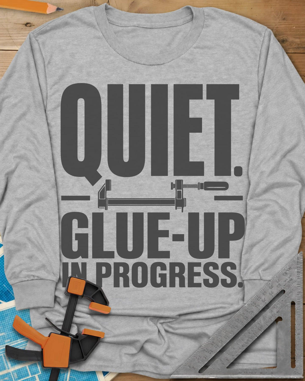 Glue-Up long sleeve shirt in Sport Grey, a small bar clamp icon between bold lines of text