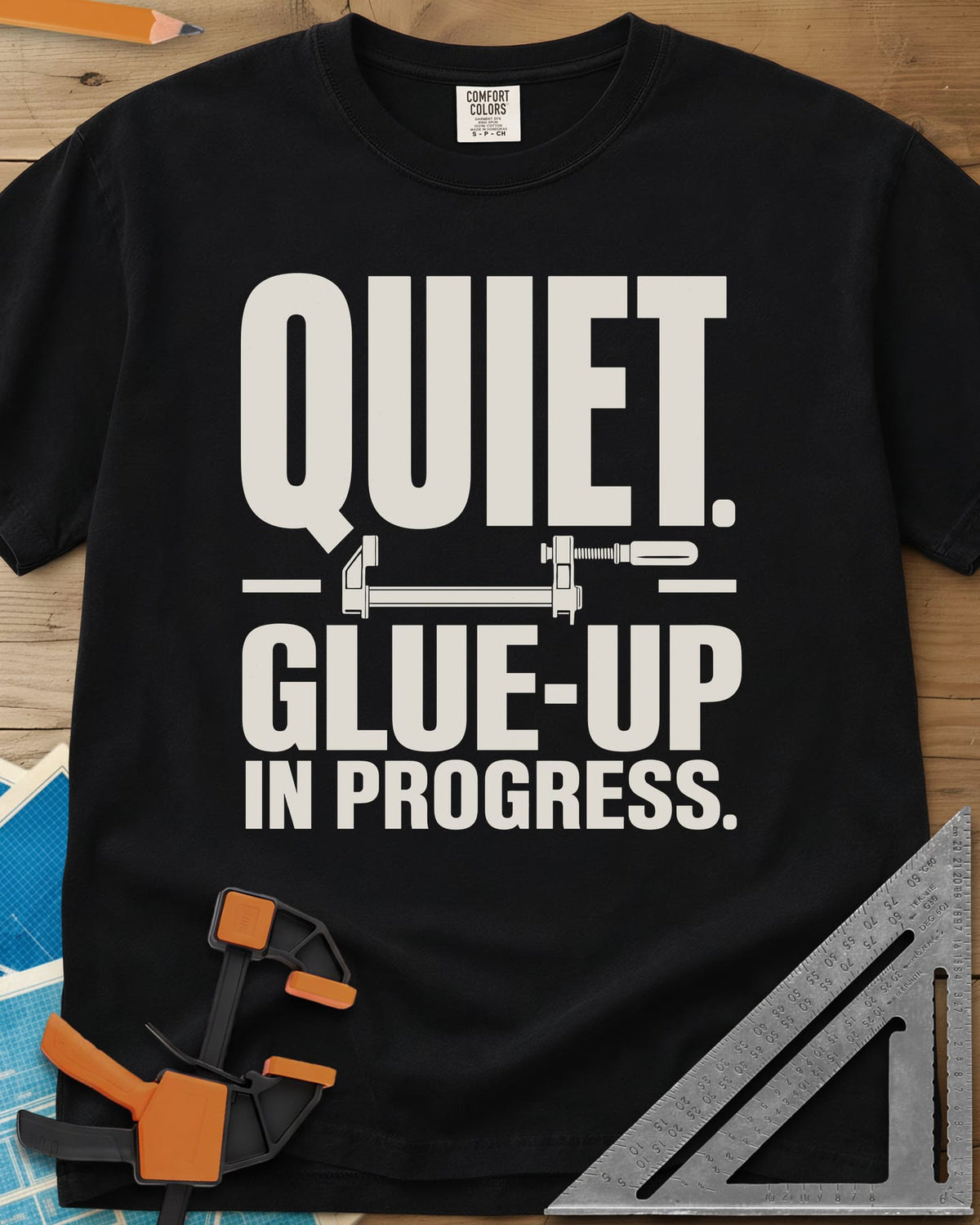 Glue-Up heavyweight tee in Black, a small bar clamp icon between bold lines of text