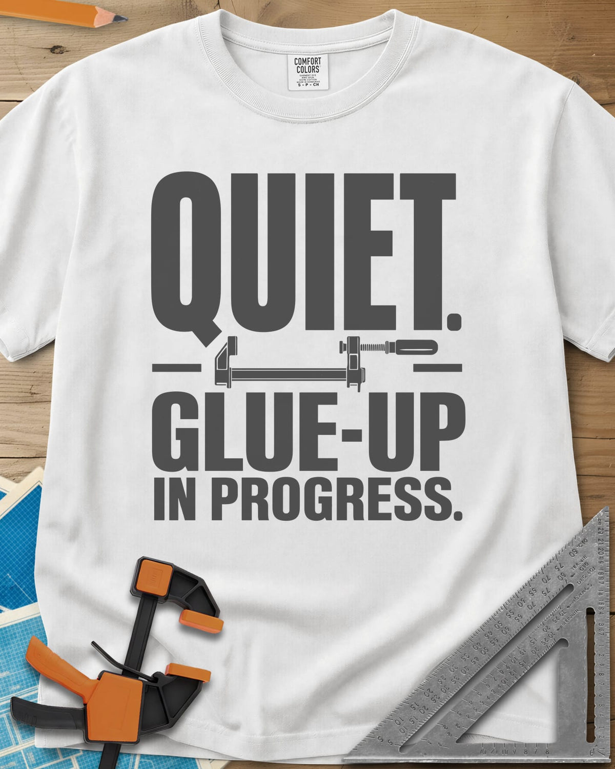 Glue-Up heavyweight tee in White, a small bar clamp icon between bold lines of text