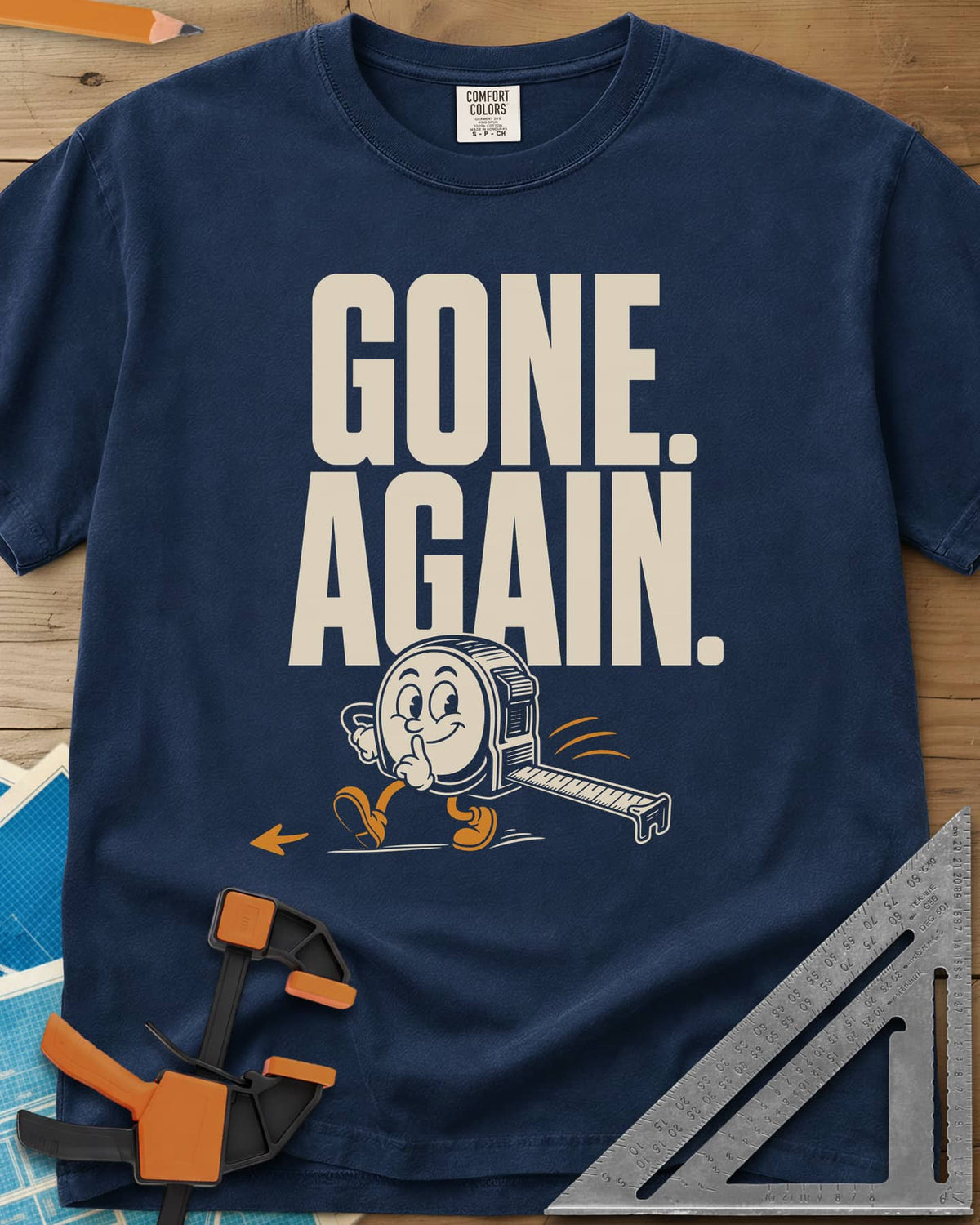 Gone Again heavyweight tee in Navy, a cartoon tape measure tiptoeing off with a finger to its lips