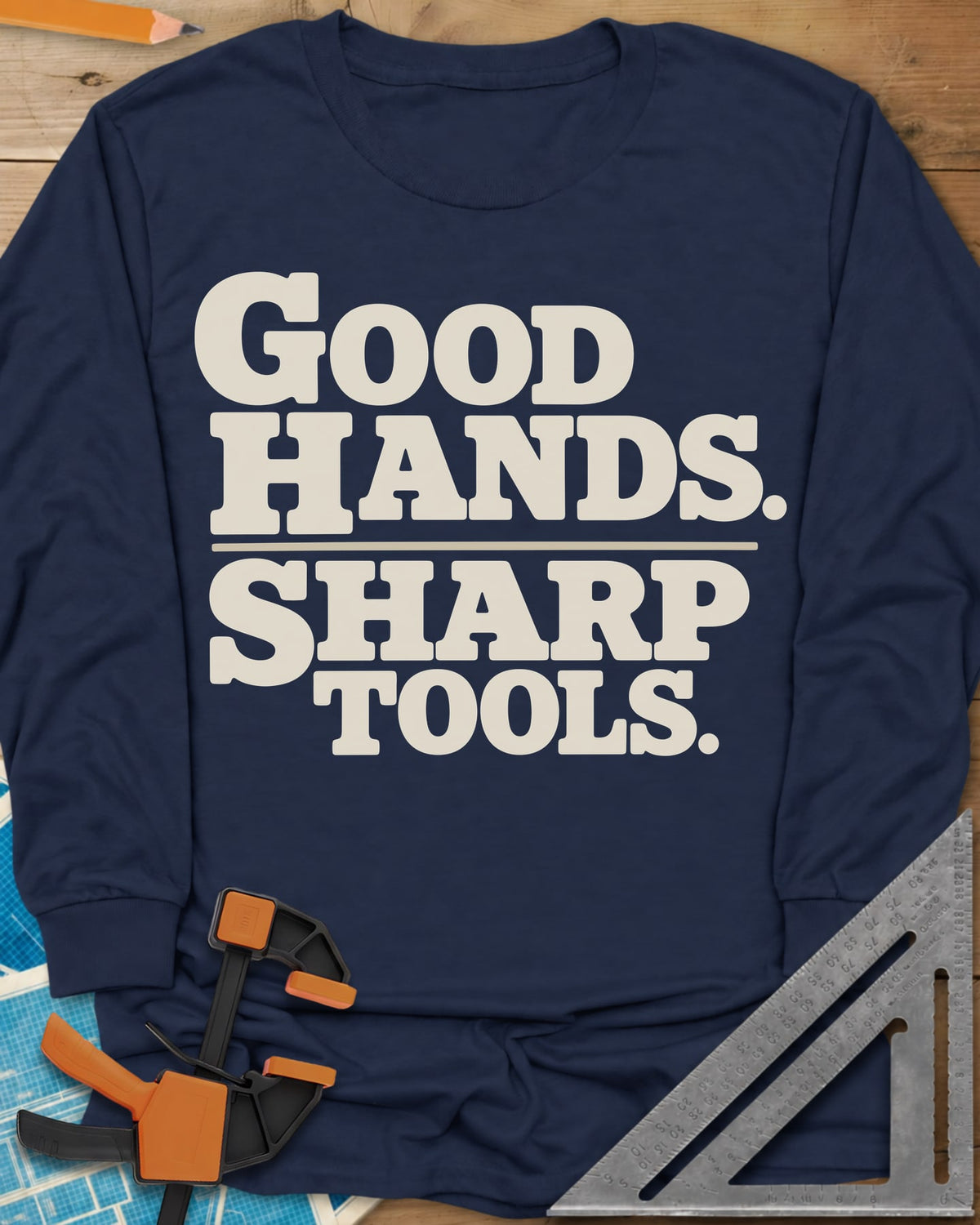 Good Hands long sleeve shirt in Navy, two lines of heavy slab-serif lettering split by a thin rule