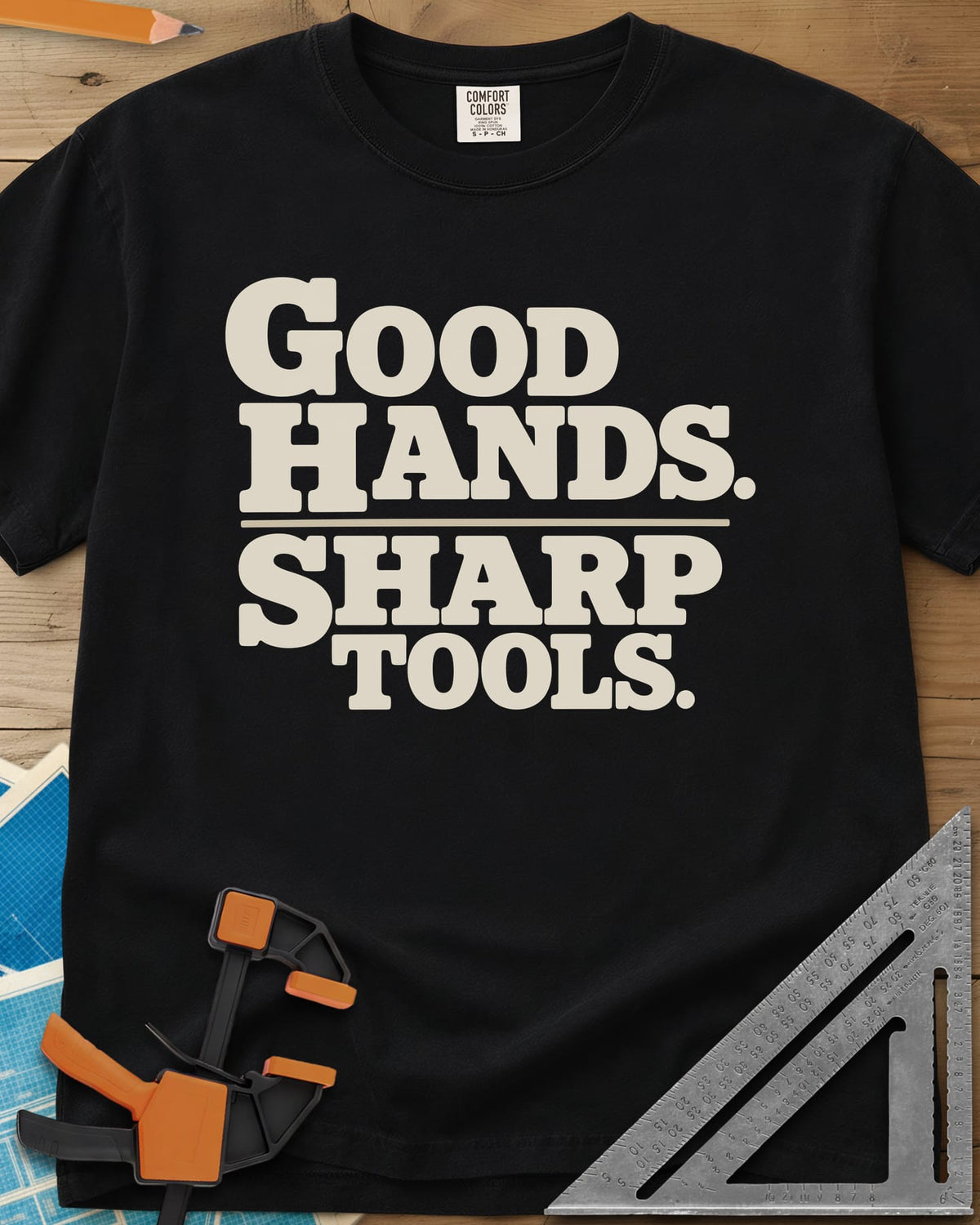 Good Hands heavyweight tee in Black, two lines of heavy slab-serif lettering split by a thin rule