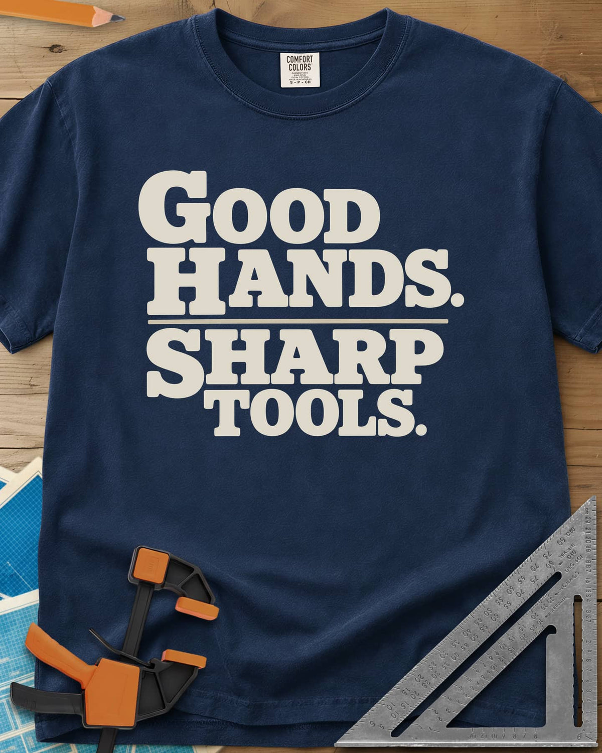 Good Hands heavyweight tee in Navy, two lines of heavy slab-serif lettering split by a thin rule