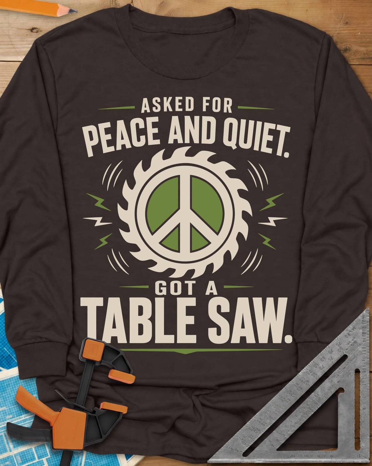 Got A Table Saw long sleeve shirt in Dark Chocolate, a peace sign inside a round saw blade with sound bursts