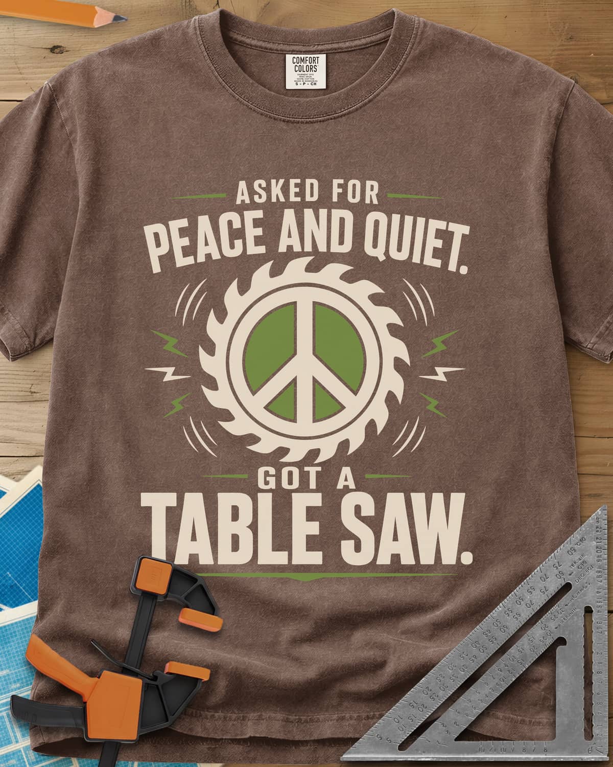 Got A Table Saw heavyweight tee in Espresso, a peace sign inside a round saw blade with sound bursts