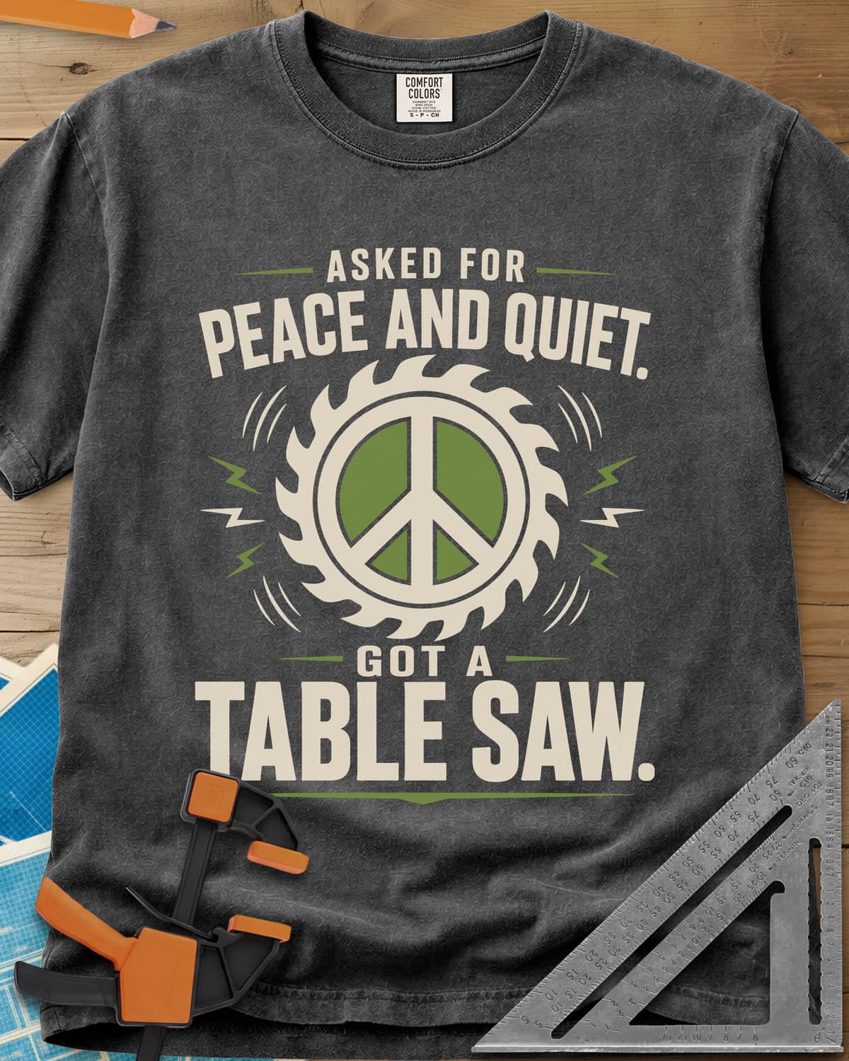 Got A Table Saw heavyweight tee in Pepper, a peace sign inside a round saw blade with sound bursts