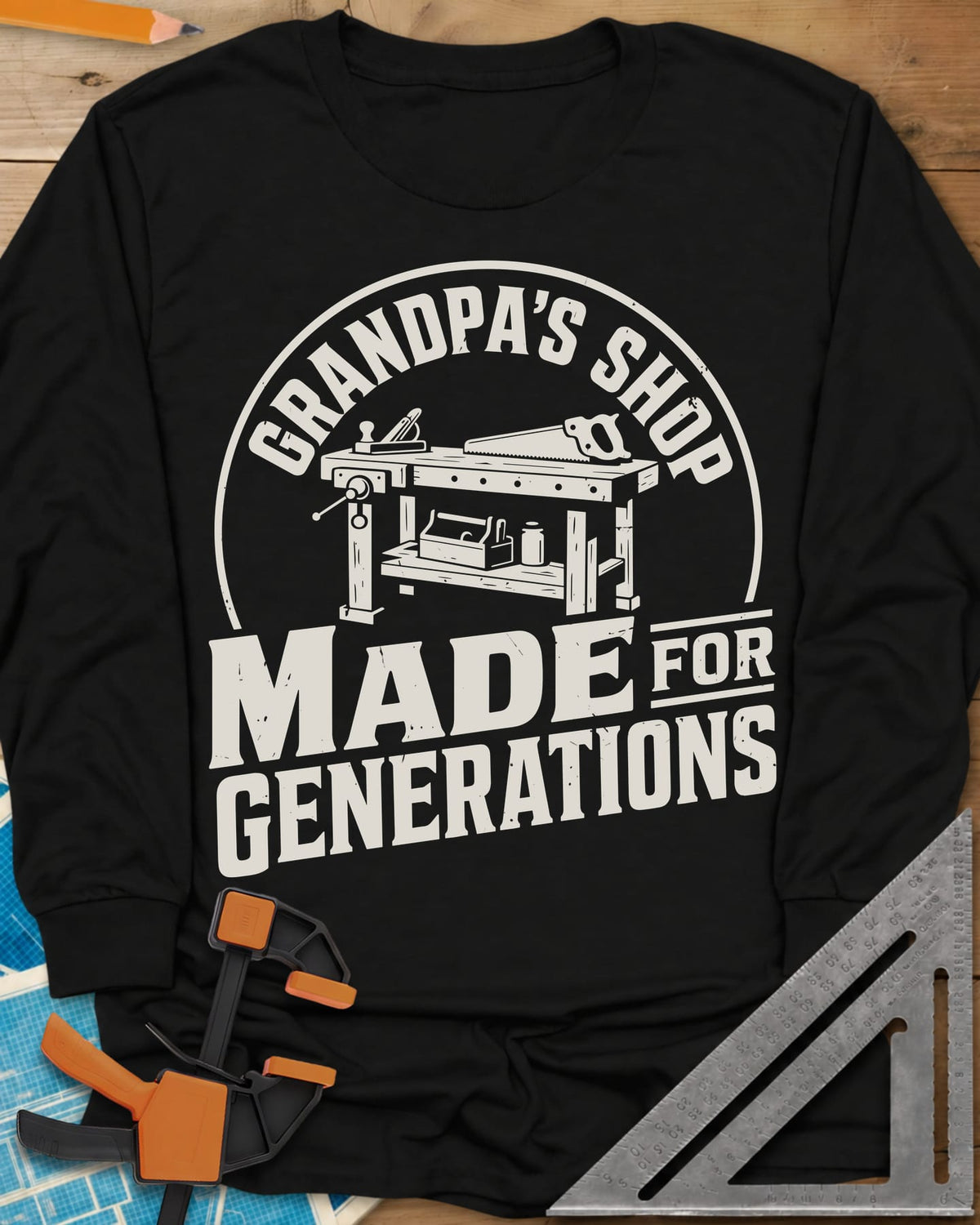 Grandpa'S Shop long sleeve shirt in Black, arched title over a workbench with a plane, handsaw and toolbox