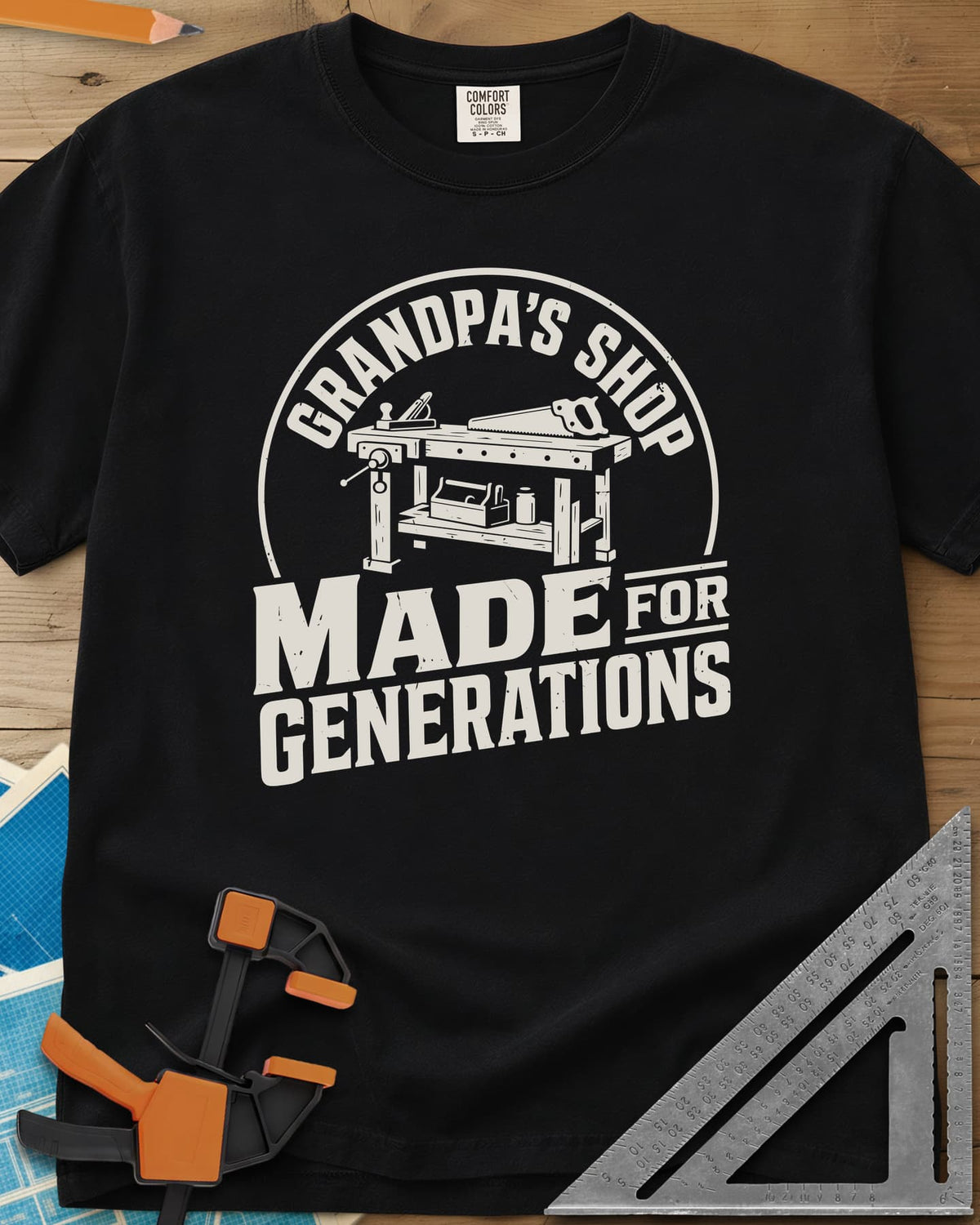 Grandpa'S Shop heavyweight tee in Black, arched title over a workbench with a plane, handsaw and toolbox