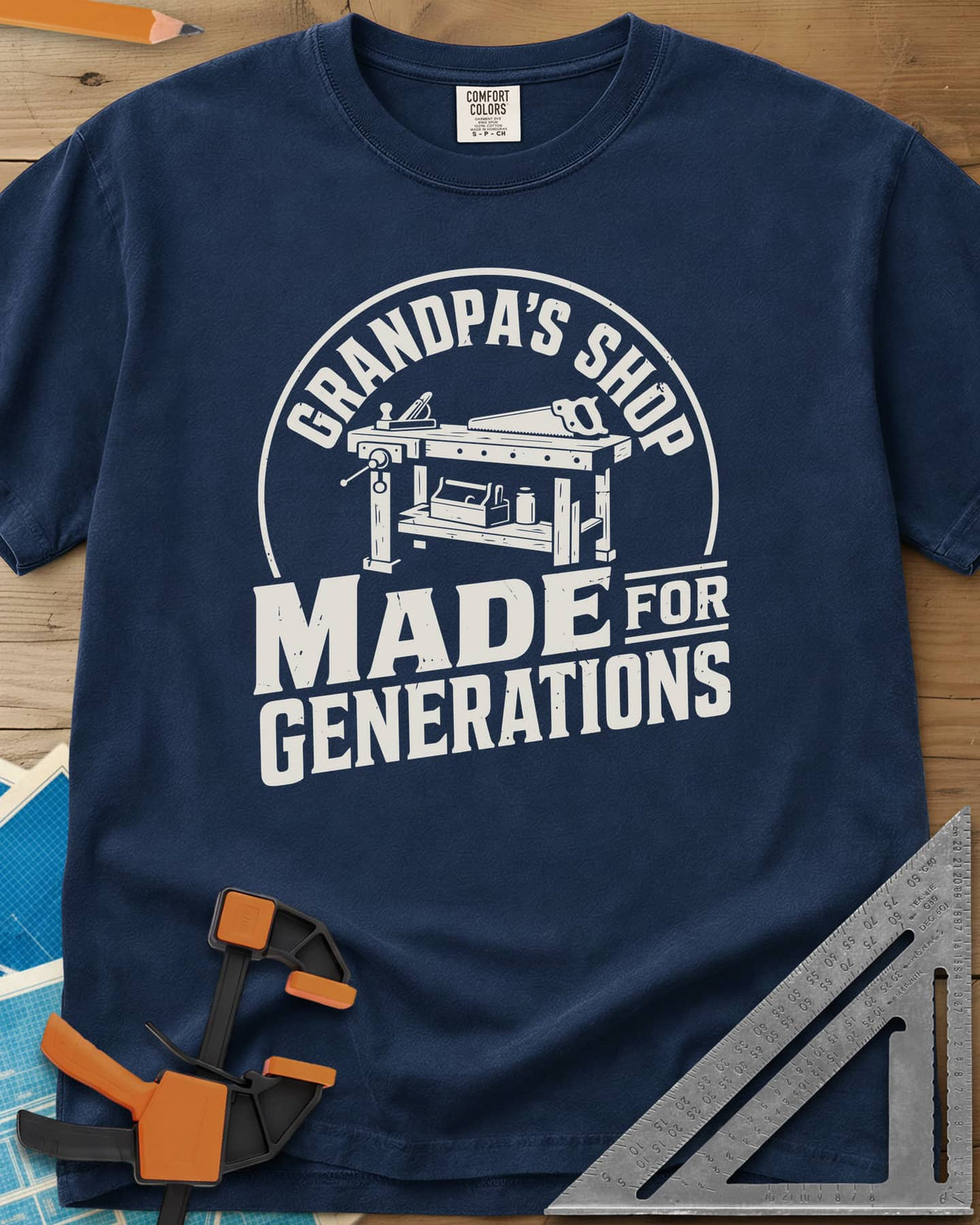 Grandpa'S Shop heavyweight tee in Navy, arched title over a workbench with a plane, handsaw and toolbox