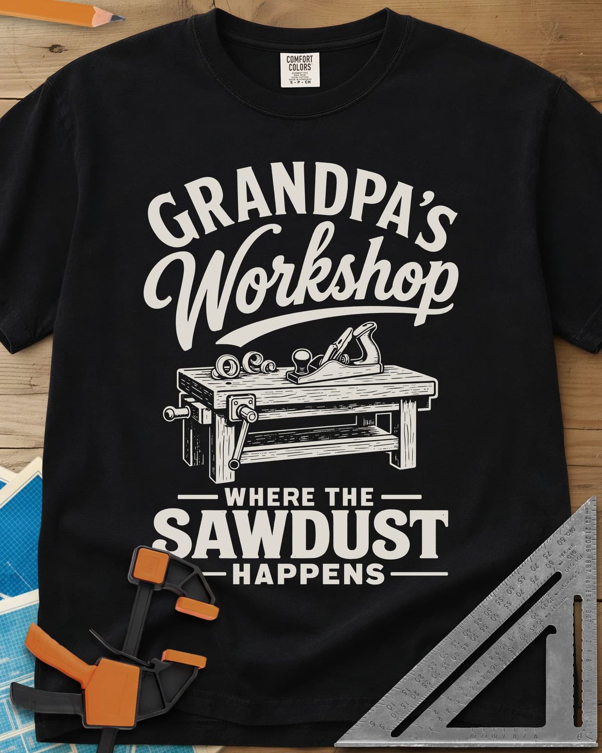 Grandpa'S Workshop heavyweight tee in Black, script lettering over a workbench with a hand plane and shavings