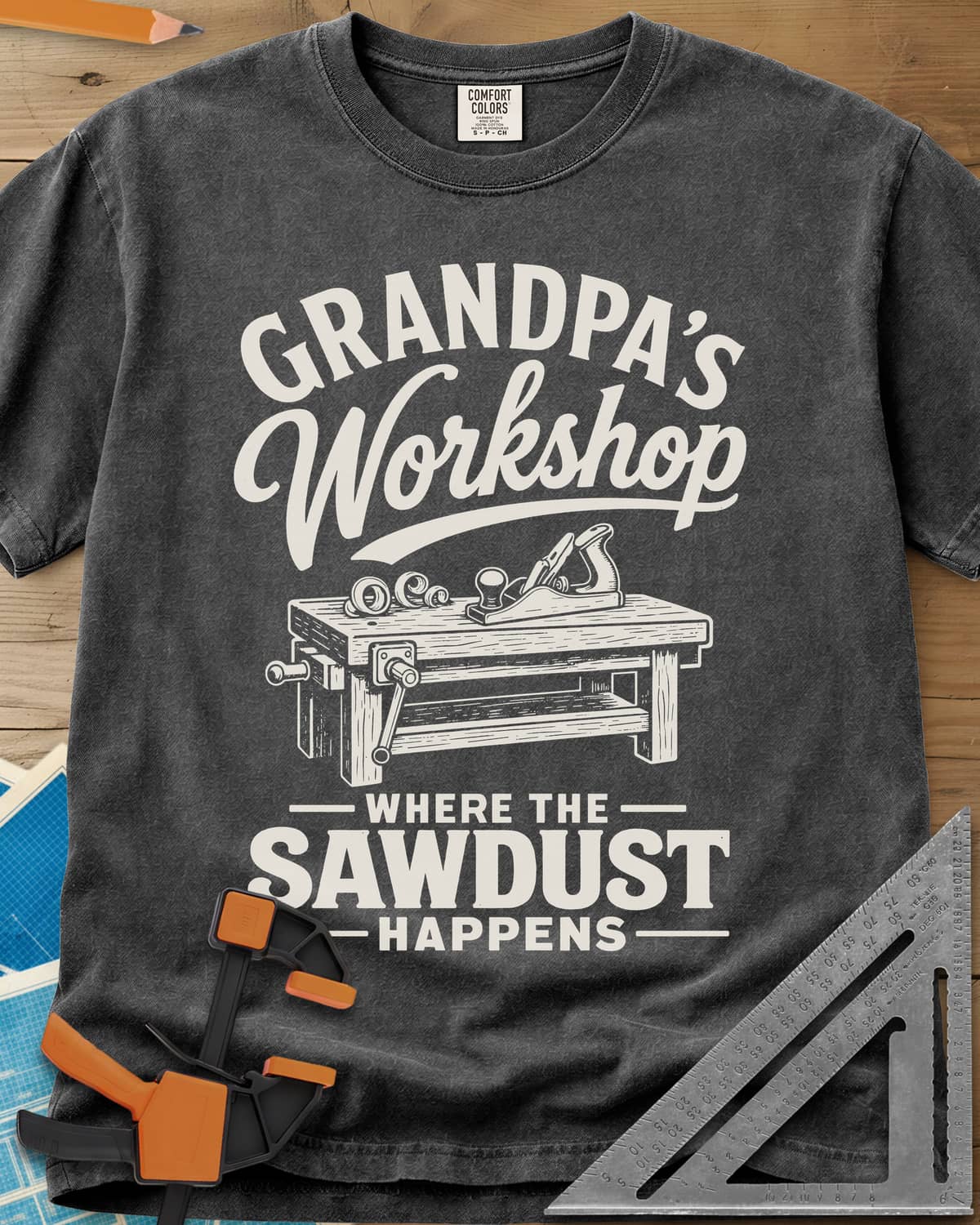 Grandpa'S Workshop heavyweight tee in Pepper, script lettering over a workbench with a hand plane and shavings