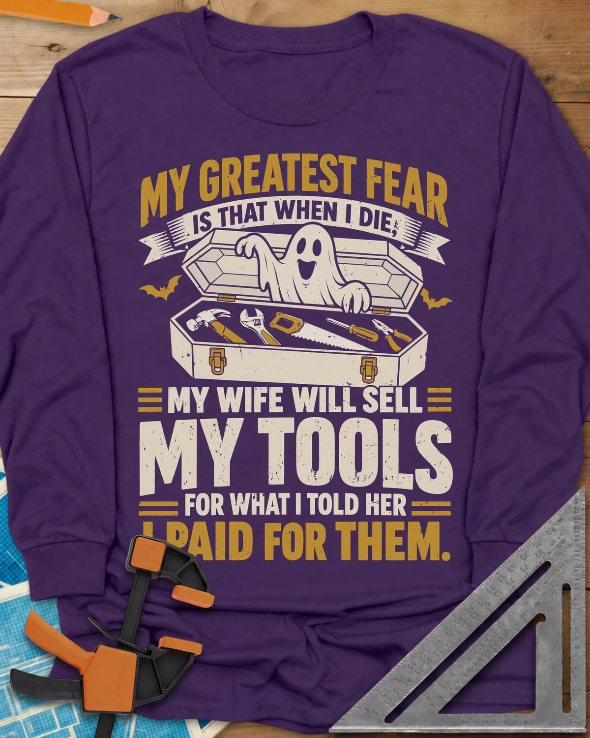 Greatest Fear long sleeve shirt in Purple, a smiling ghost rising from an open coffin-style toolbox