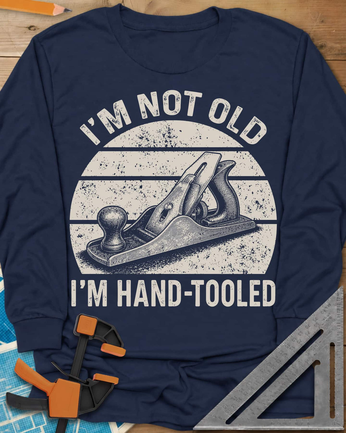 Hand Tooled long sleeve shirt in Navy, a bench plane in a retro sunset circle