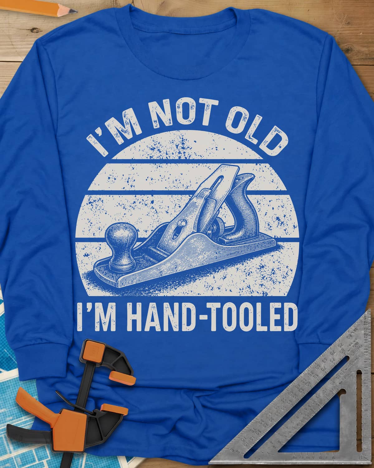 Hand Tooled long sleeve shirt in Royal, a bench plane in a retro sunset circle