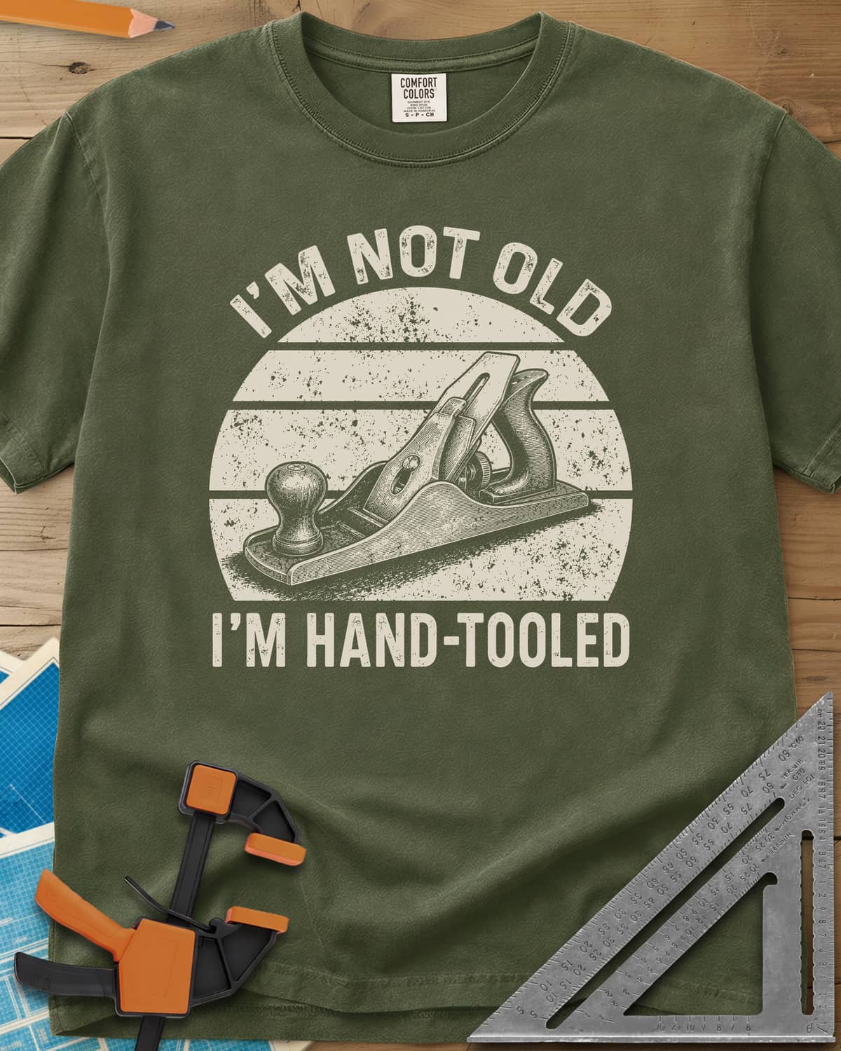 Hand Tooled heavyweight tee in Hemp, a bench plane in a retro sunset circle