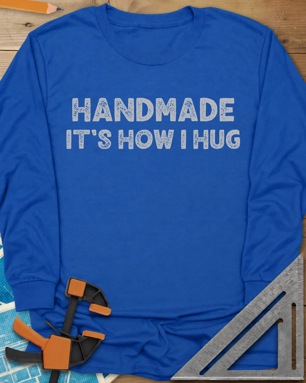 Handmade It's How I Hug long sleeve shirt in Royal, two lines of rough, distressed block lettering, no graphic