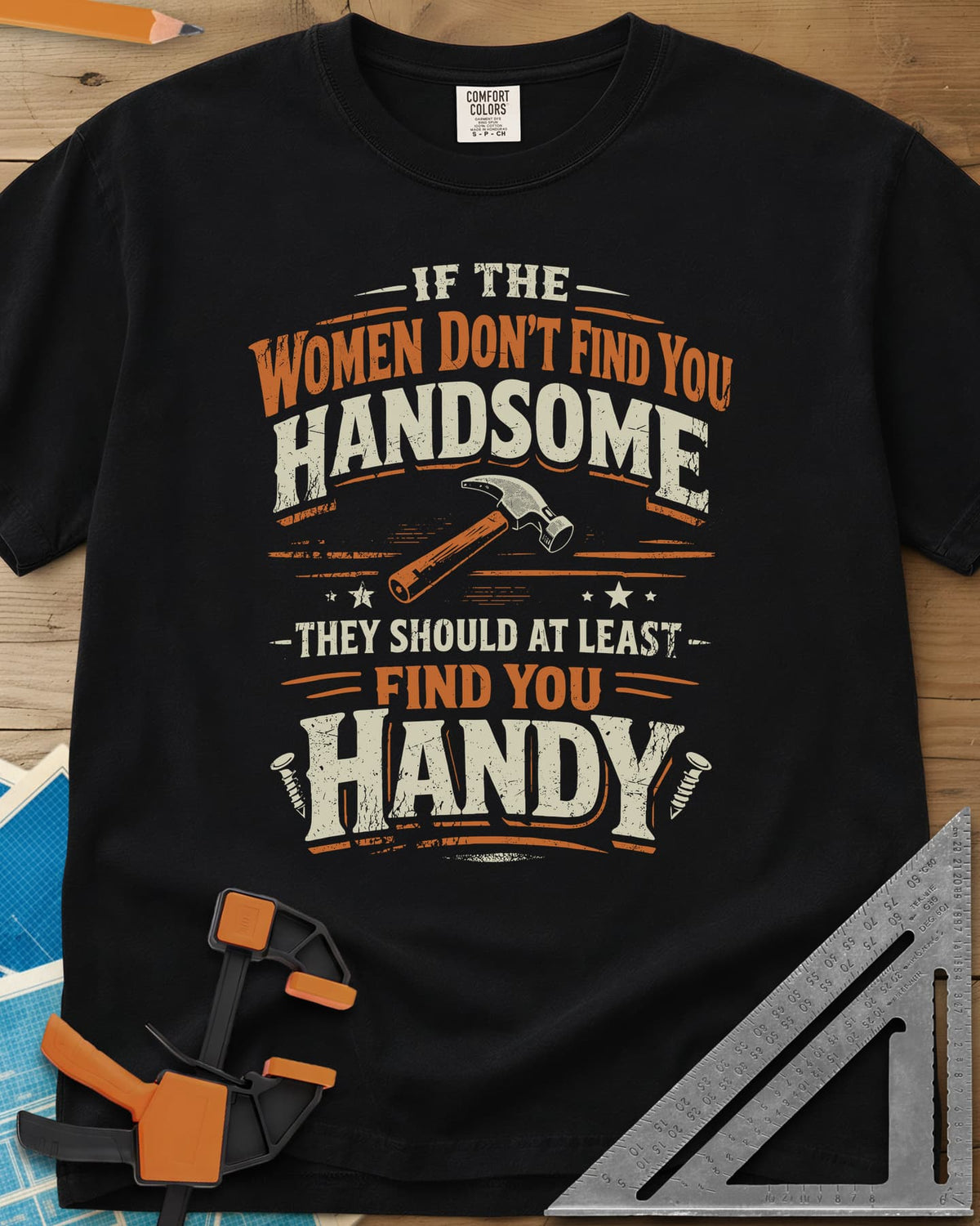Handsome heavyweight tee in Black, stacked slogan around a hammer, with stars and two screws