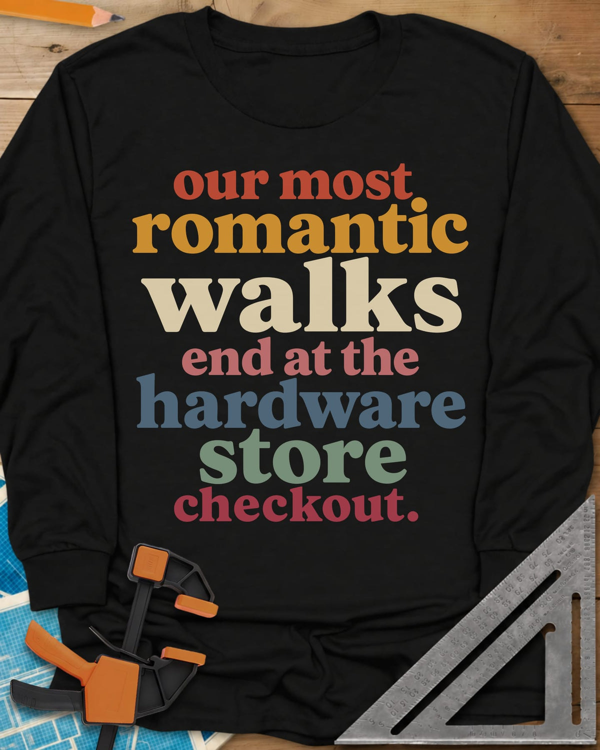 Hardware Store Checkout long sleeve shirt in Black, stacked lowercase type in rust, mustard, cream, pink, blue and sage