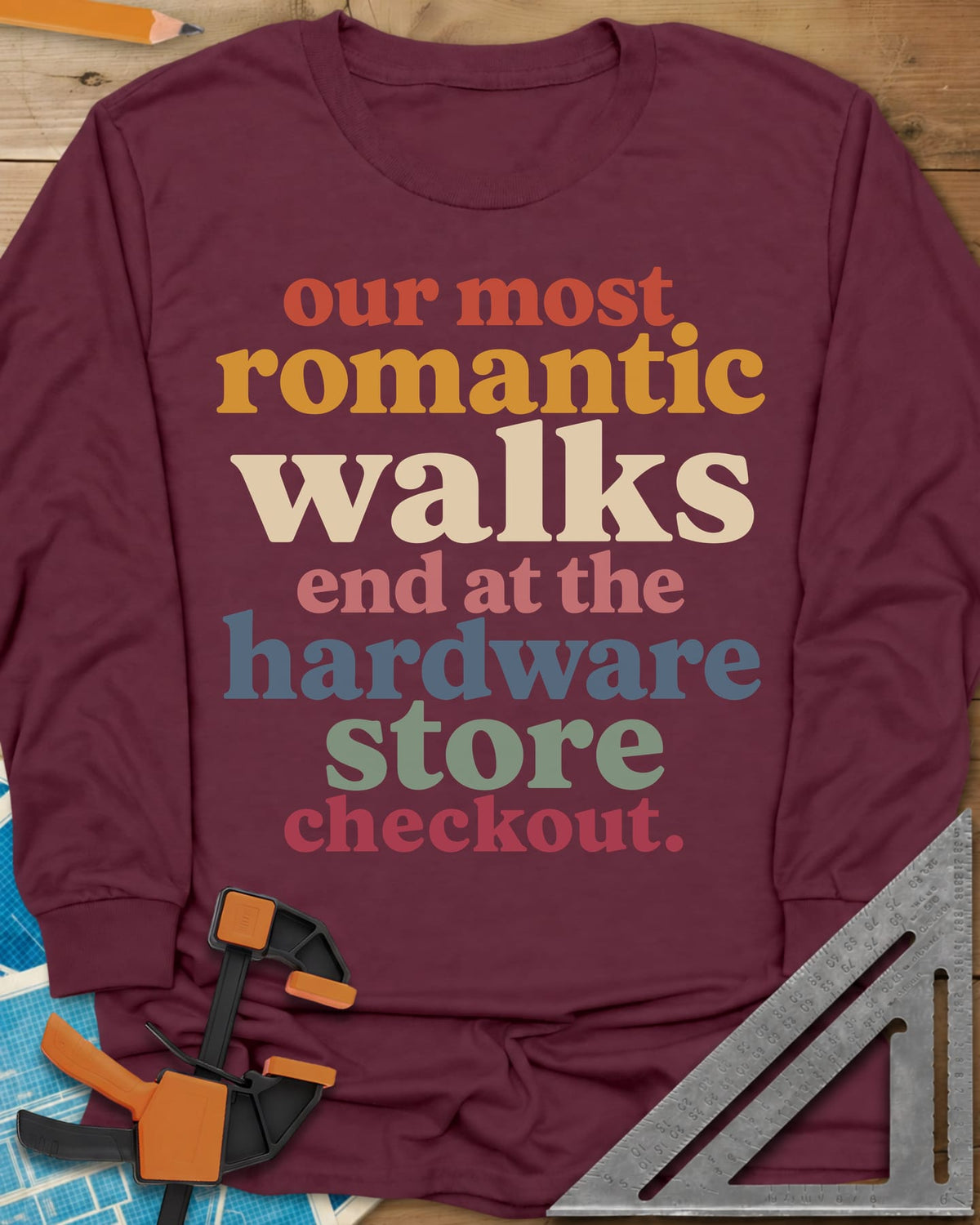 Hardware Store Checkout long sleeve shirt in Maroon, stacked lowercase type in rust, mustard, cream, pink, blue and sage