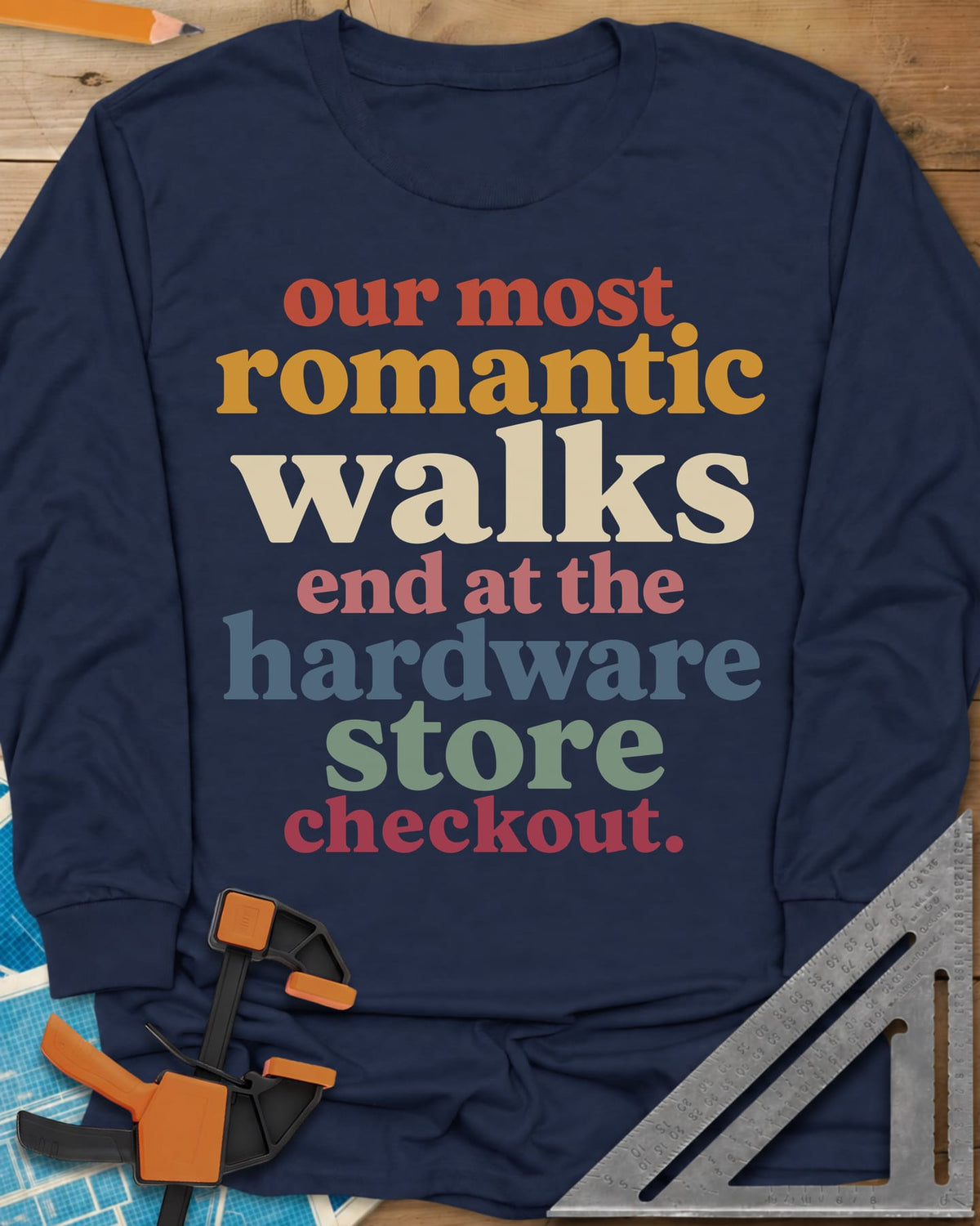Hardware Store Checkout long sleeve shirt in Navy, stacked lowercase type in rust, mustard, cream, pink, blue and sage