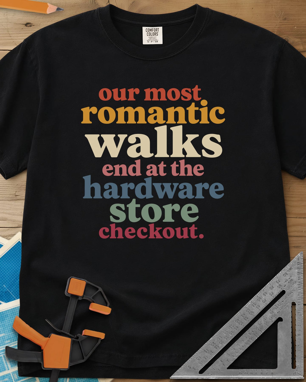 Hardware Store Checkout heavyweight tee in Black, stacked lowercase type in rust, mustard, cream, pink, blue and sage