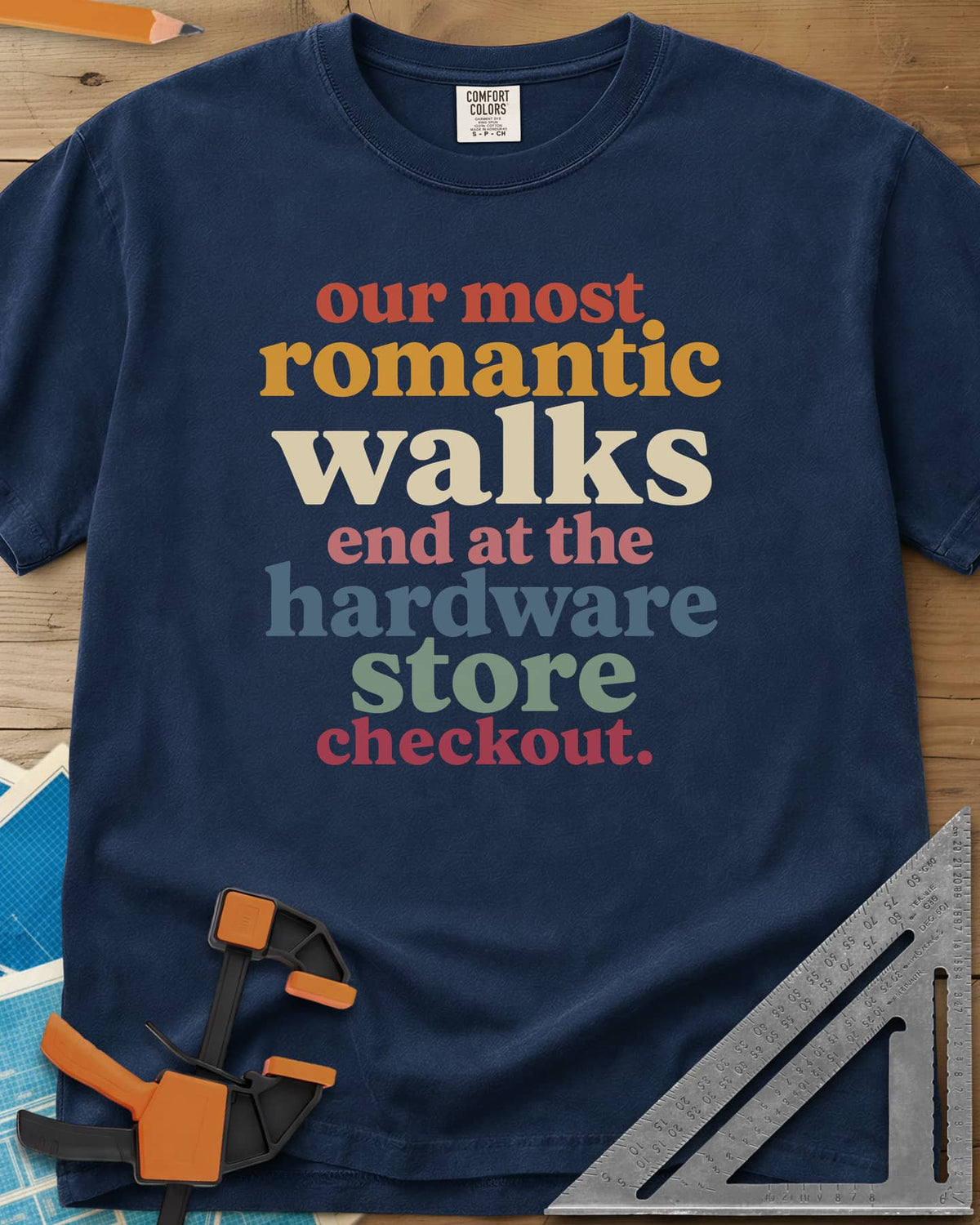 Hardware Store Checkout heavyweight tee in Navy, stacked lowercase type in rust, mustard, cream, pink, blue and sage